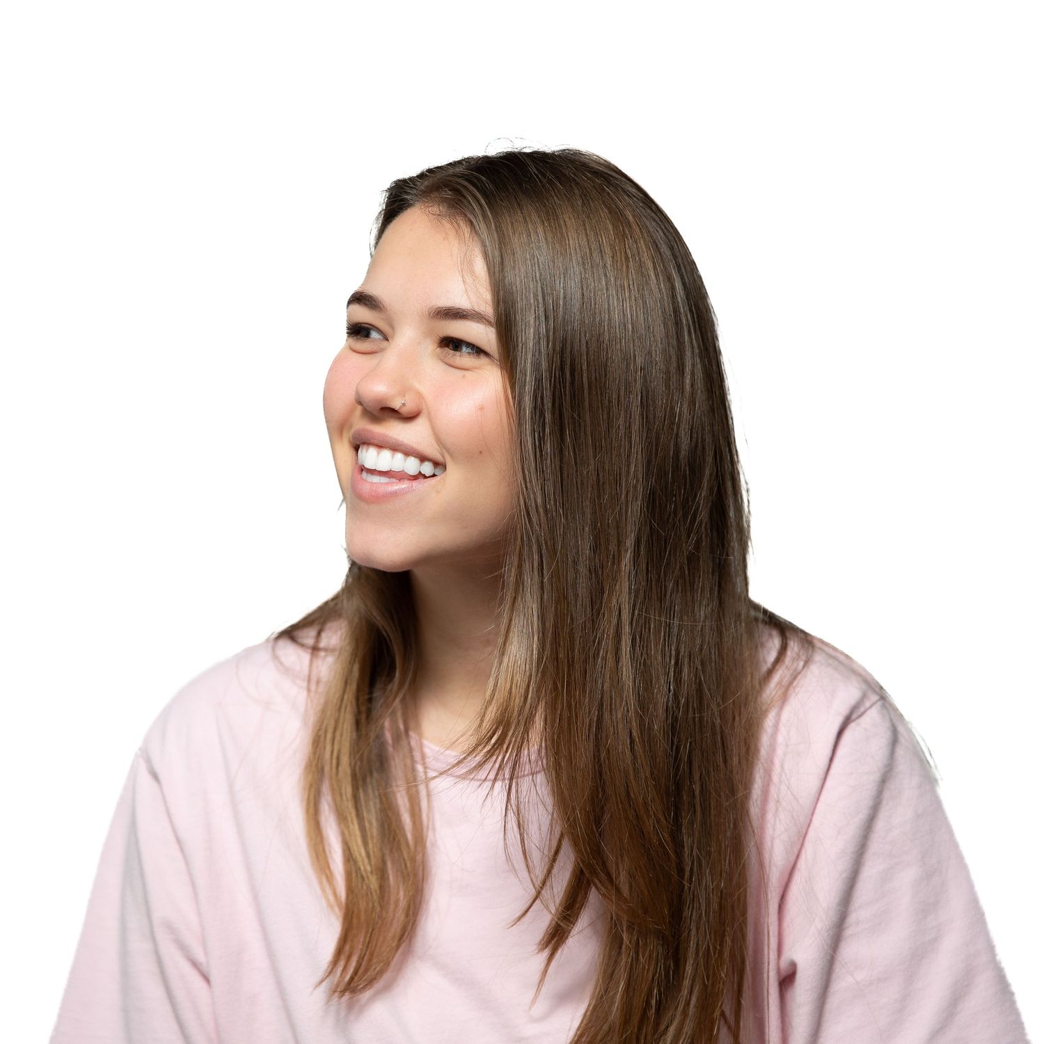 Professional headshot for 31Digital, looking to the side confidently against black backdrop under bright studio lighting.