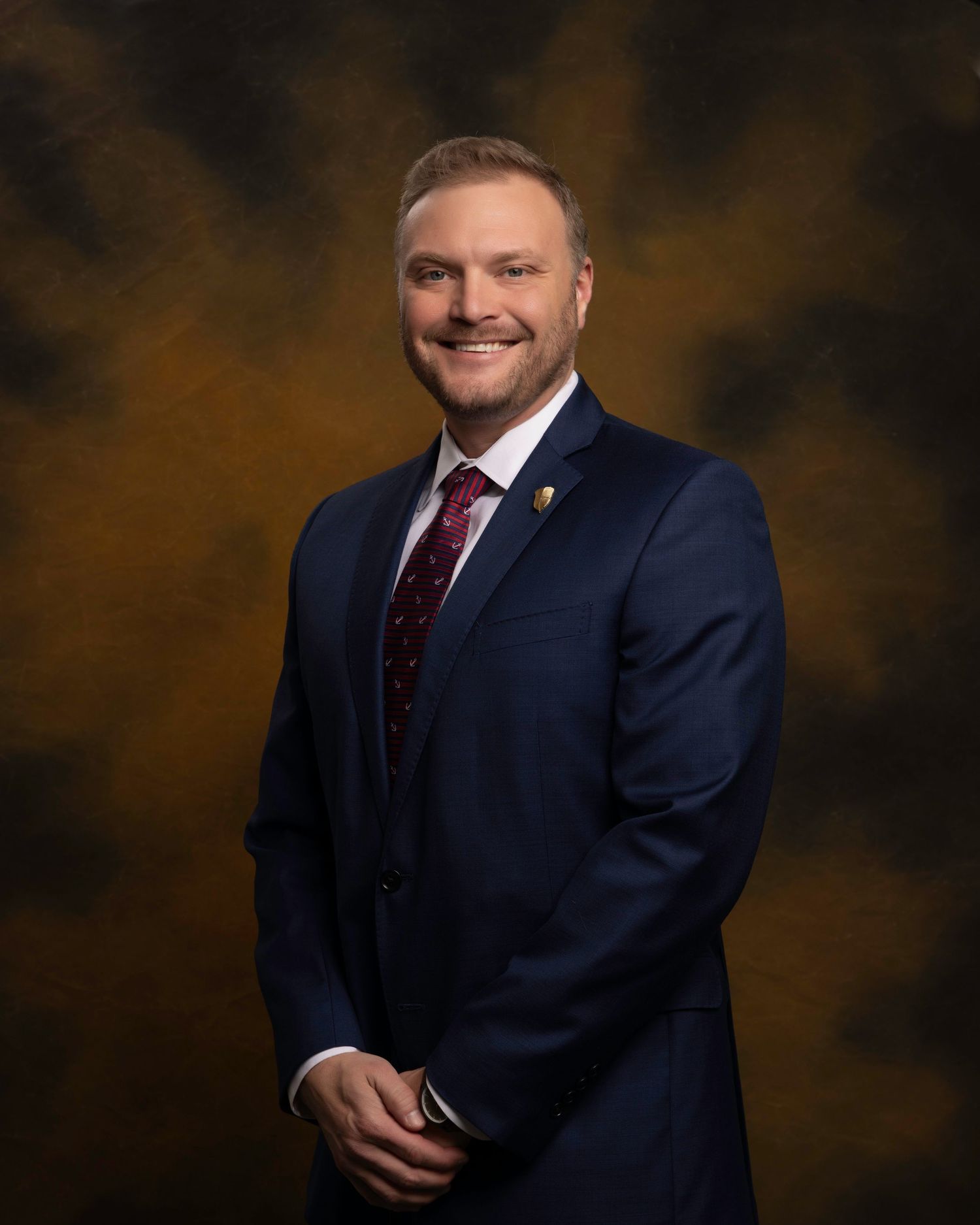 Co-CEO headshot for board member, confident and polished look with custom background, captured for NWTF Foundation.