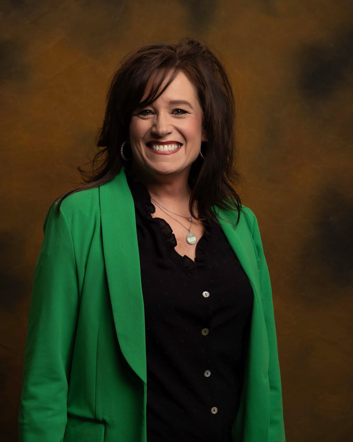 Executive headshot for board member, beautiful and joyful look with custom background, captured for NWTF Foundation.
