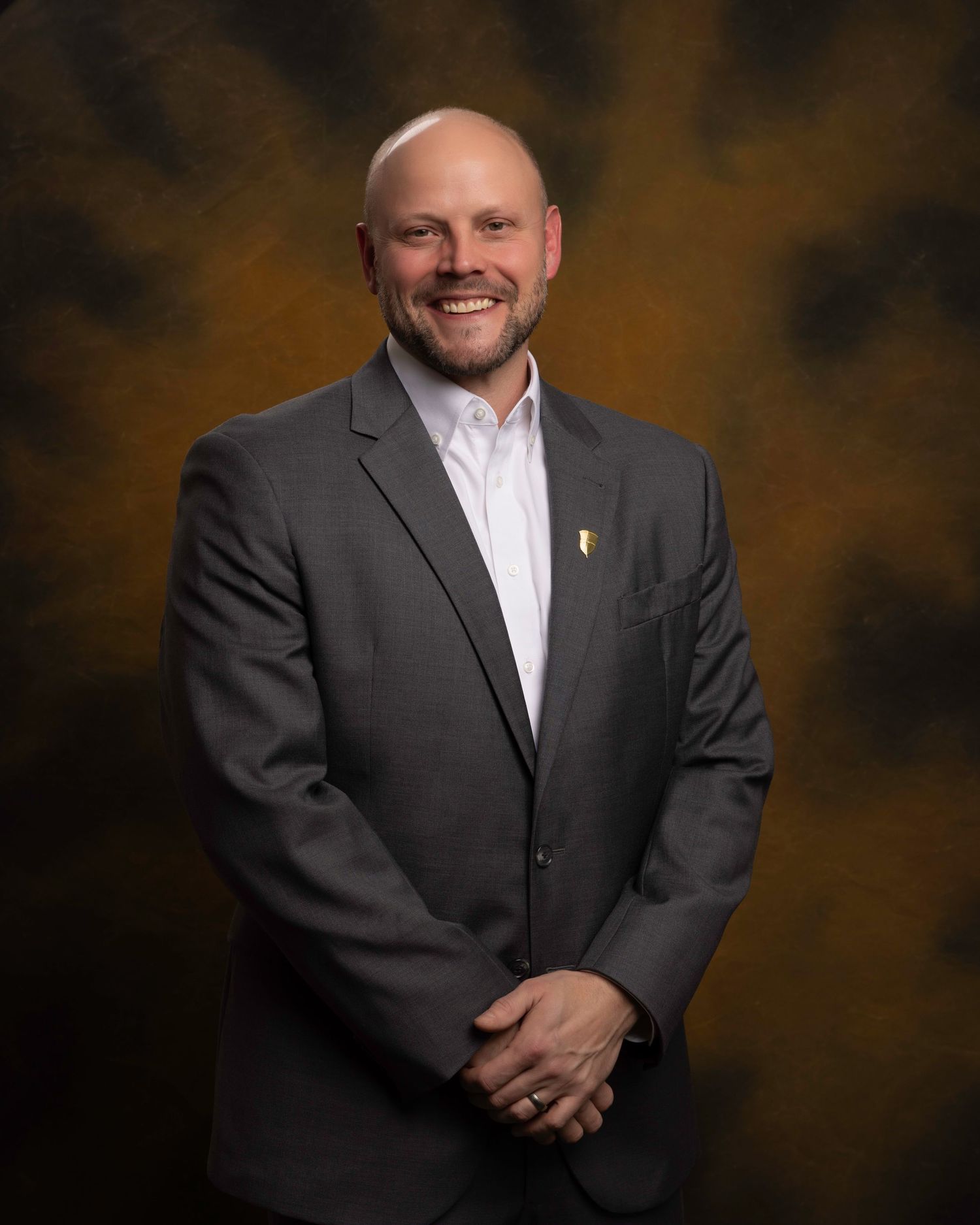 CEO headshot for board member, confident and polished look with custom background, captured for NWTF Foundation.