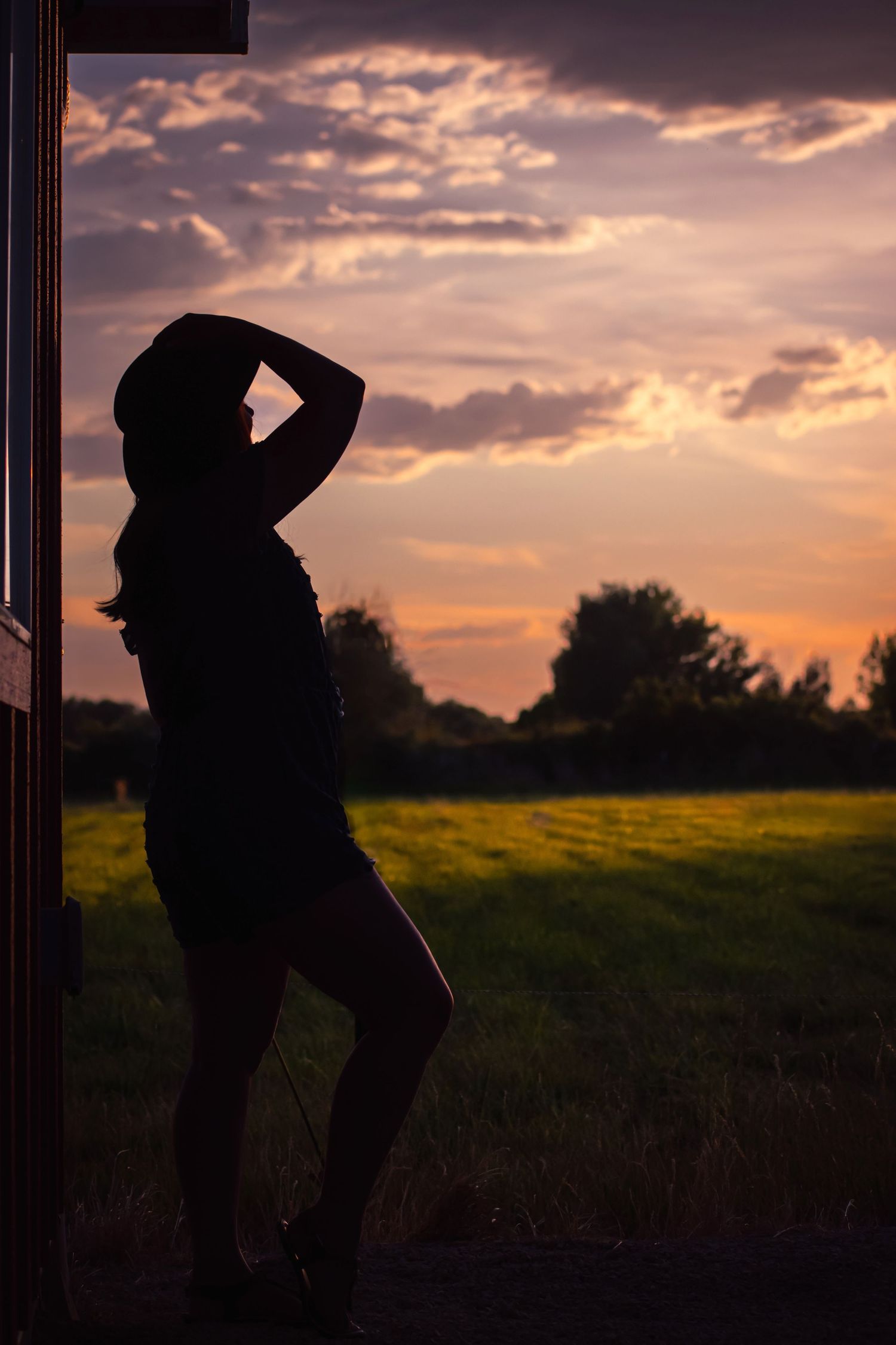 Sunset photo in the country with female silhouette