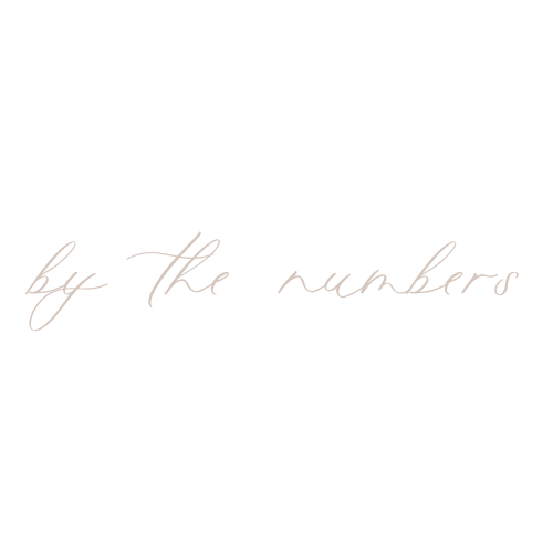 Cursive neon sign displaying 'life the members' text against a black background.