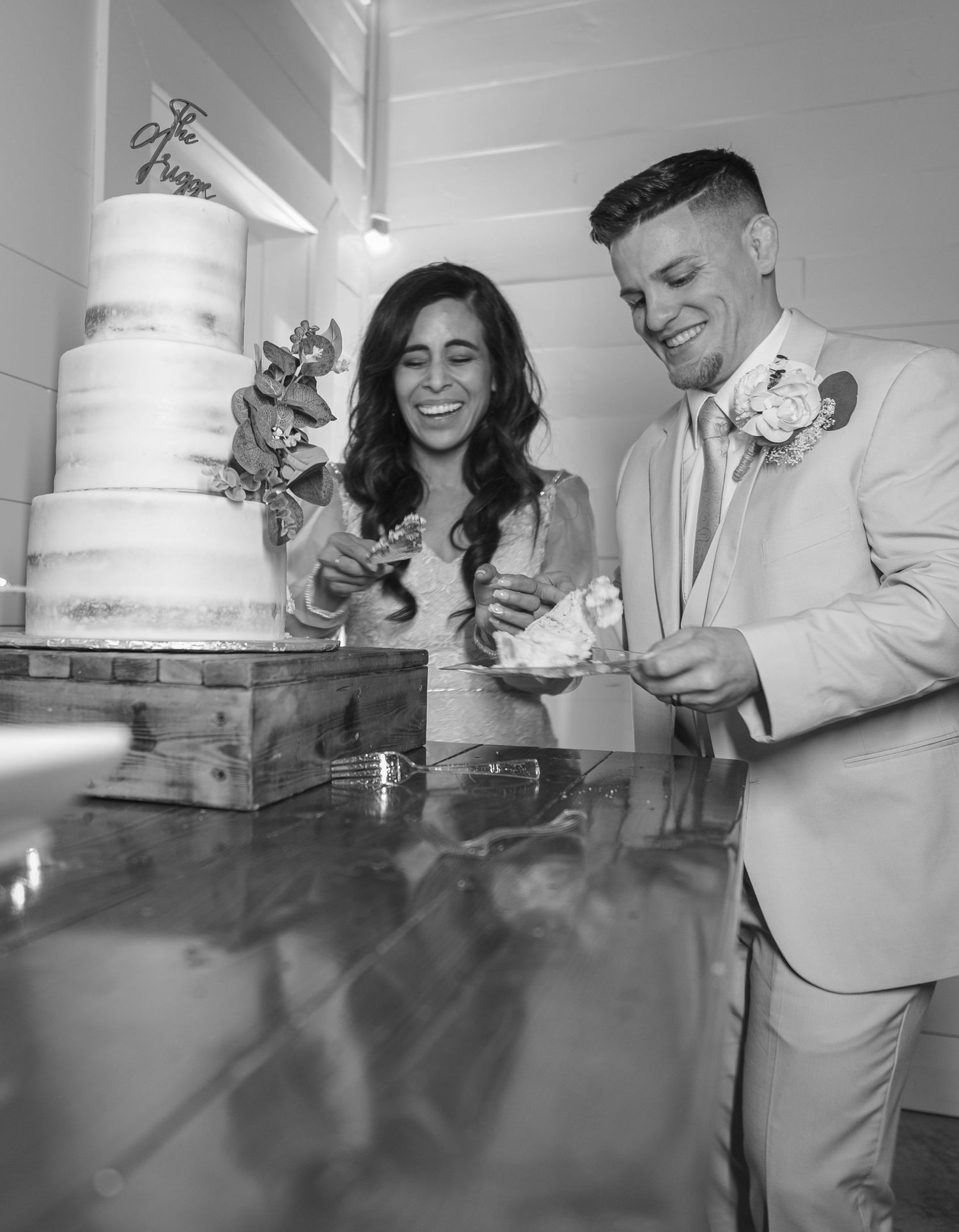 Wedding cake decorating process shown in black and white sequence photos.