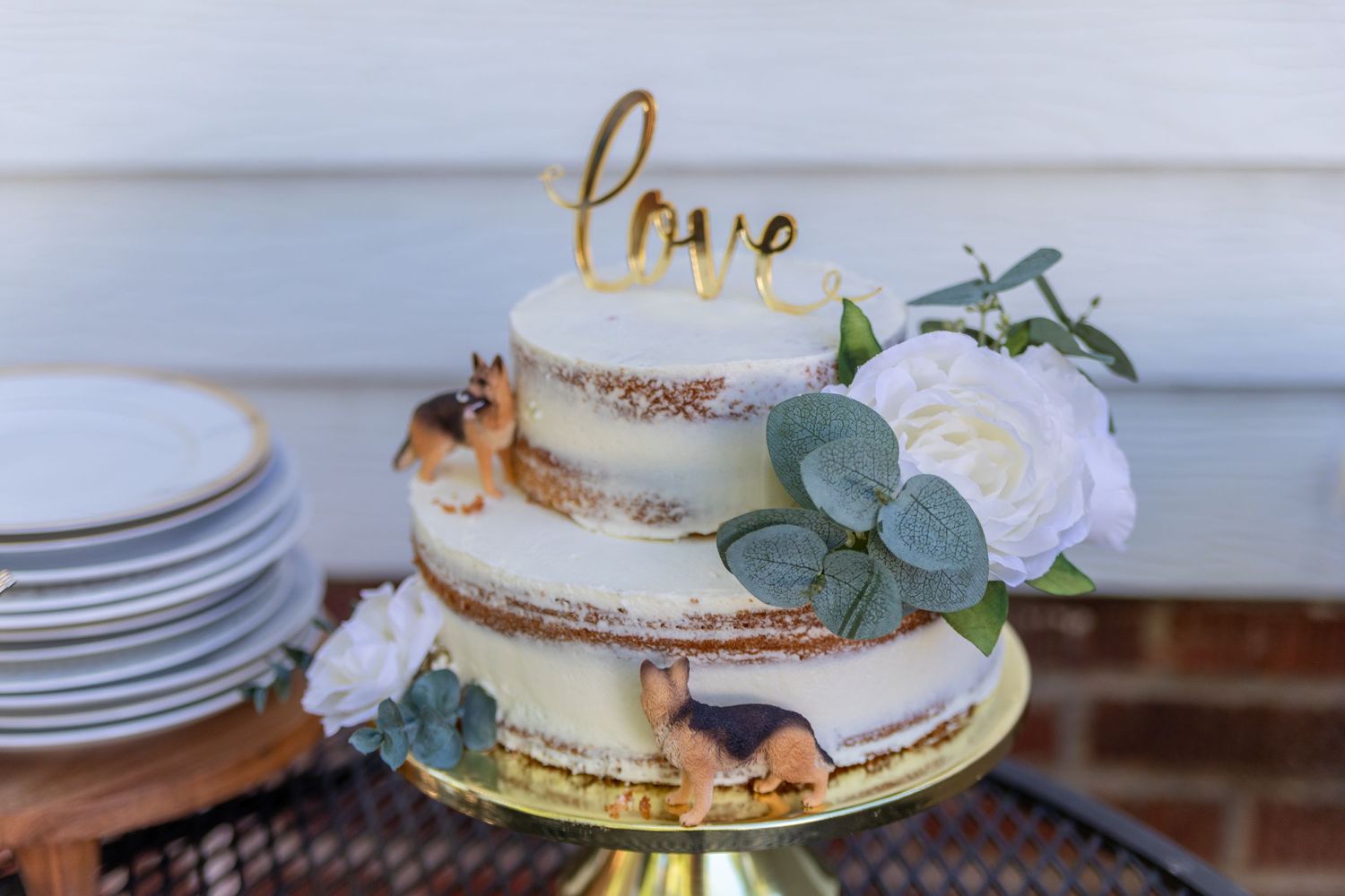Elegant wedding cake adorned with delicate details, perfectly designed to complement the theme of a beautifully curated wedding celebration.