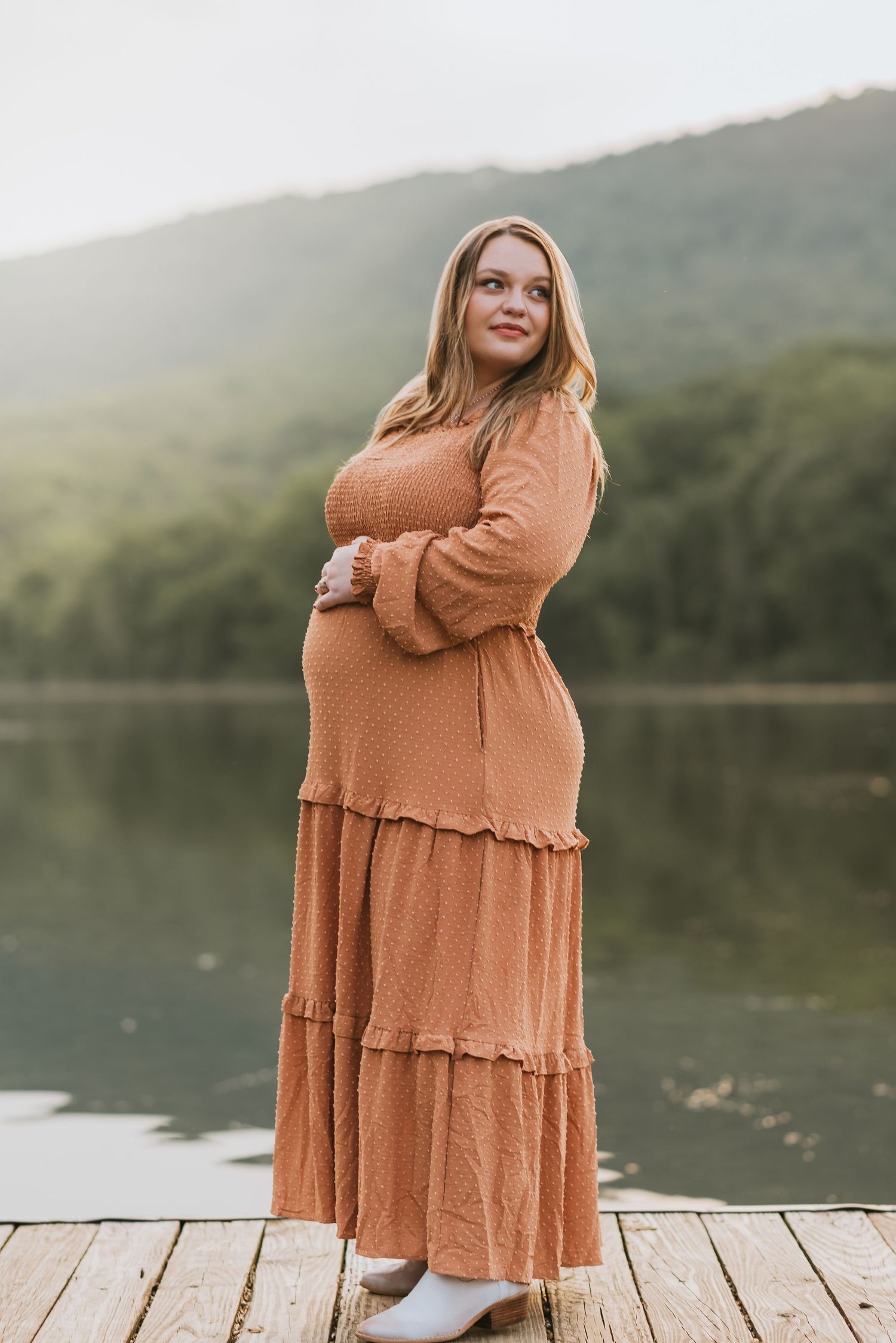 Dallas looking over shoulder with water and mountain in background, Chattanooga, TN – family maternity session, soft summer light