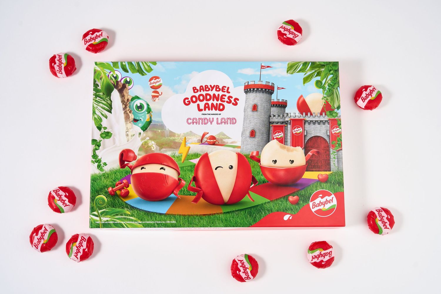 Holiday-themed board game artwork with candy decorations and castle scenery.