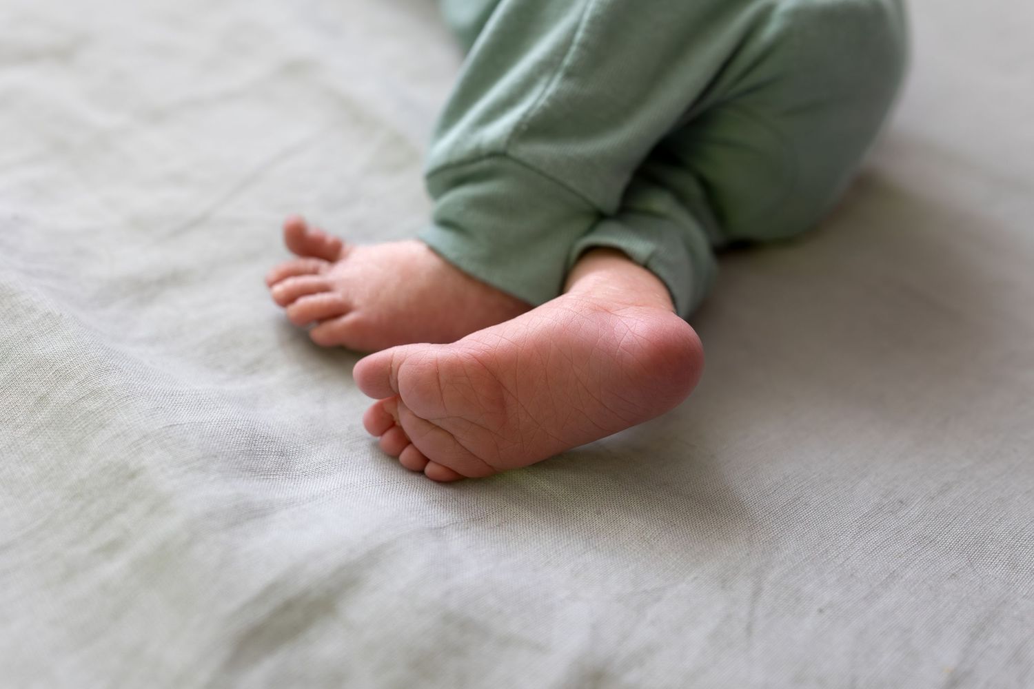 Close up image of a newborns tiny feet.