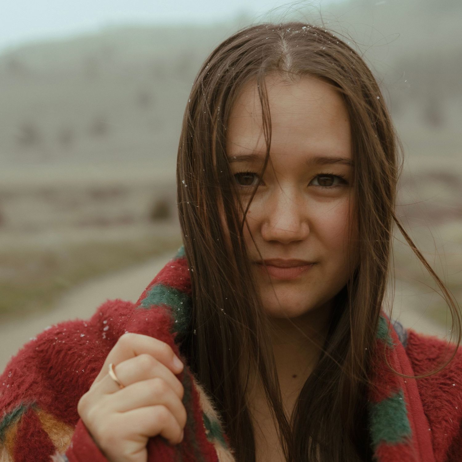 A headshot of a woman