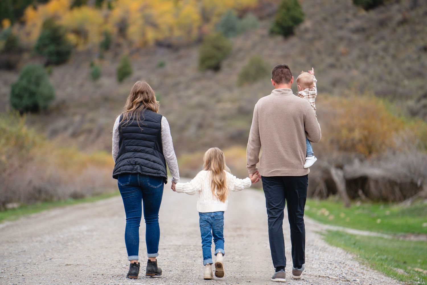 Family Walking down a Road