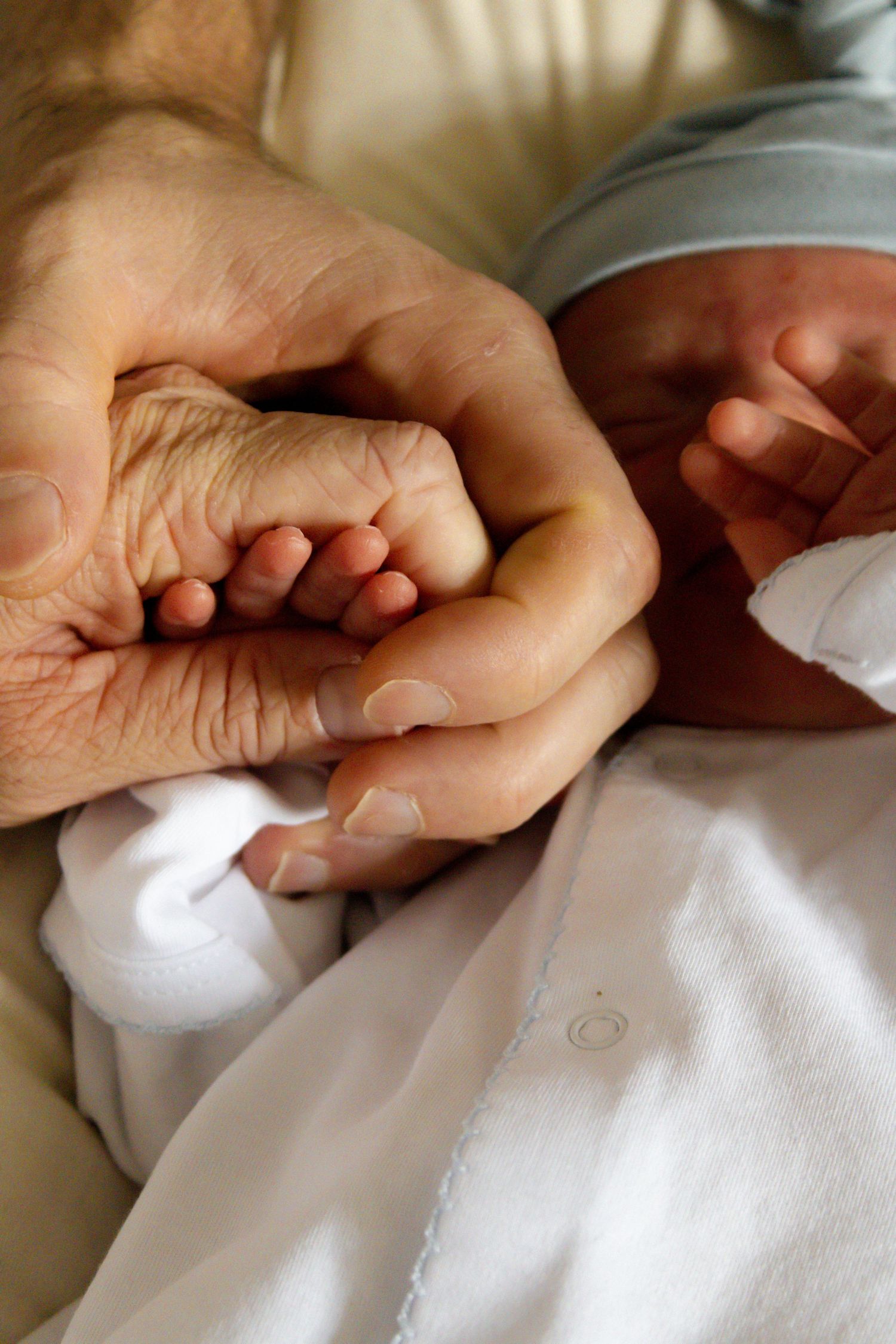 baby, parents, mom and dad holding babies hand, focus on hands