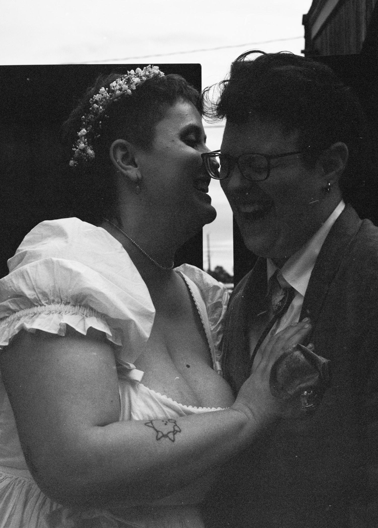 Black and white film photography of a queer couple wedding in Washington state.