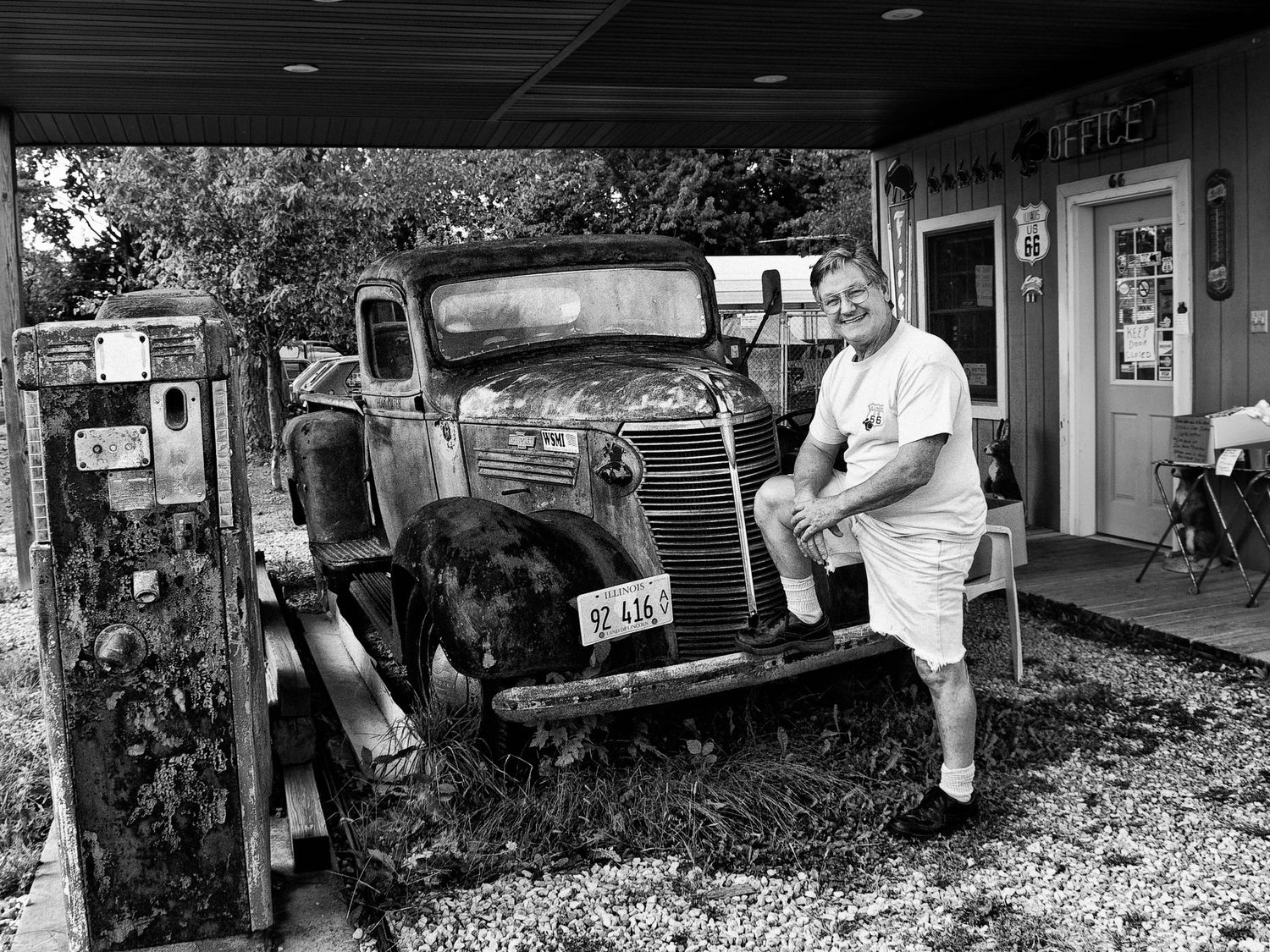 black and white portrait with old car, gas station on Route 66. Illinois