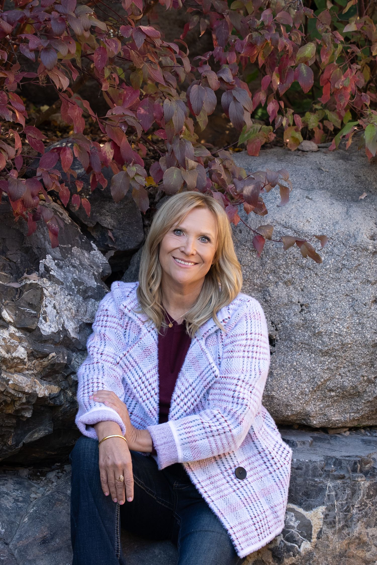 Head shot for an entrepreneur's website. Outdoors, relaxed, looking into camera. Different positions.