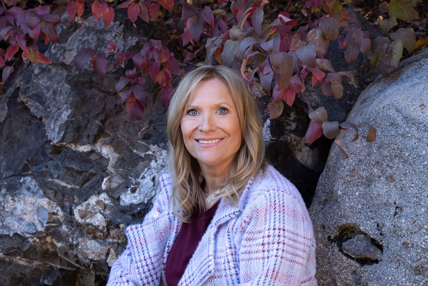 Head shot for an entrepreneur's website. Outdoors, relaxed, looking into camera. Different positions.