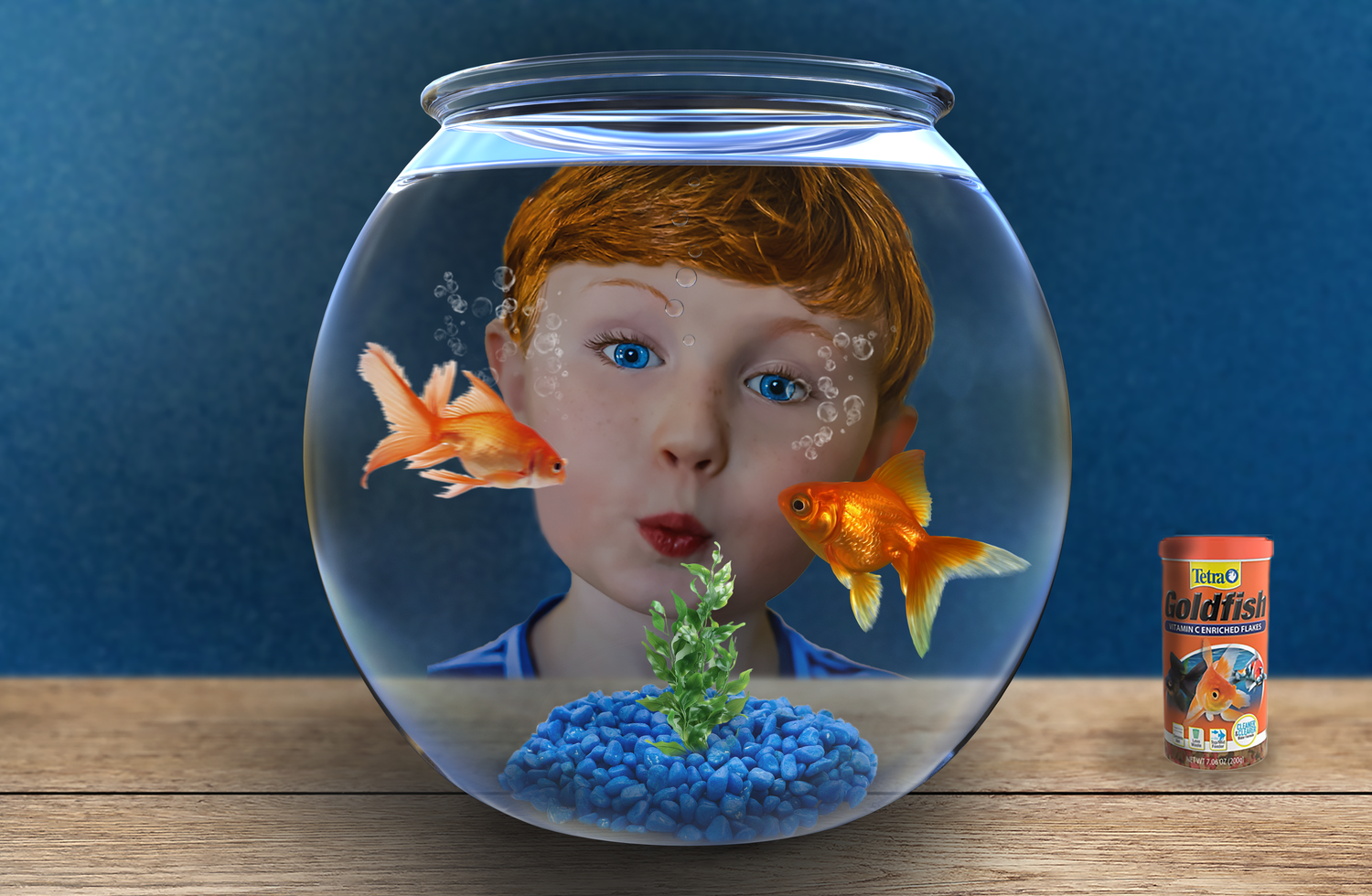A composite image of Dimitri as he makes fish faces with a goldfish.