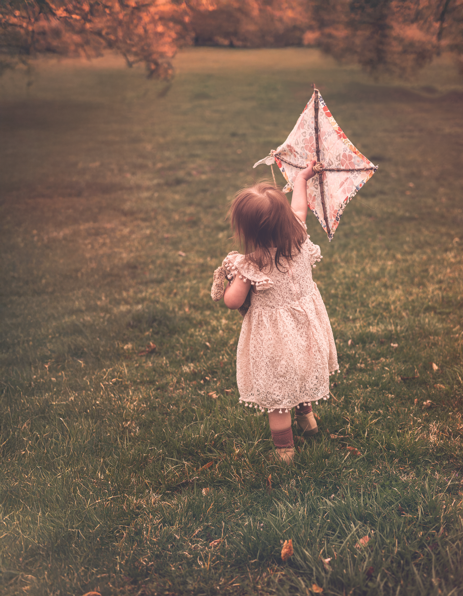 Daisy flies a kite.