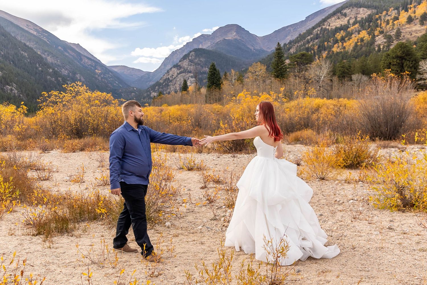 Couple eloping in Colorado surrounded by breathtaking mountain views, vibrant landscapes, and intimate moments