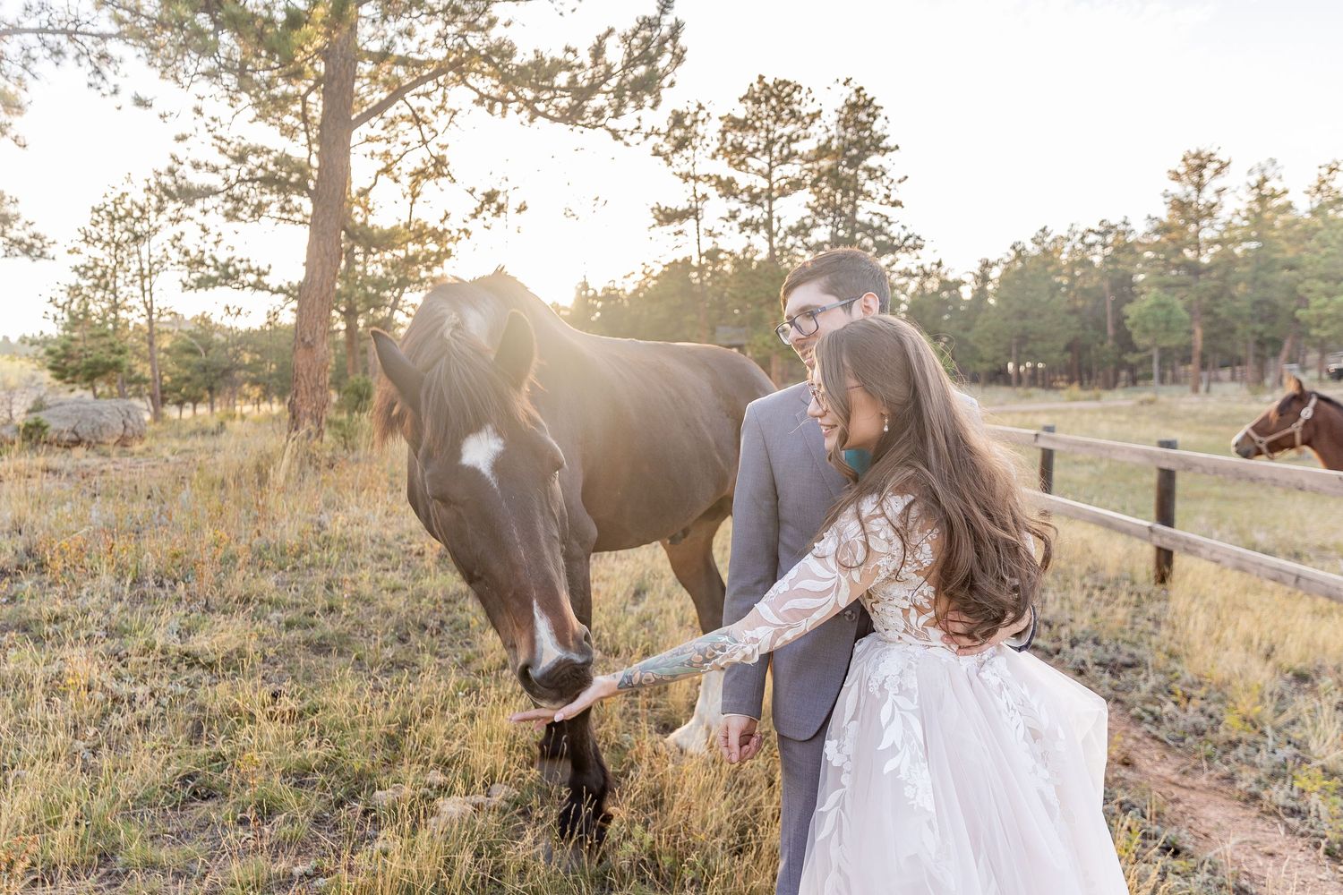 Couple eloping in Colorado surrounded by breathtaking mountain views, vibrant landscapes, and intimate moments
