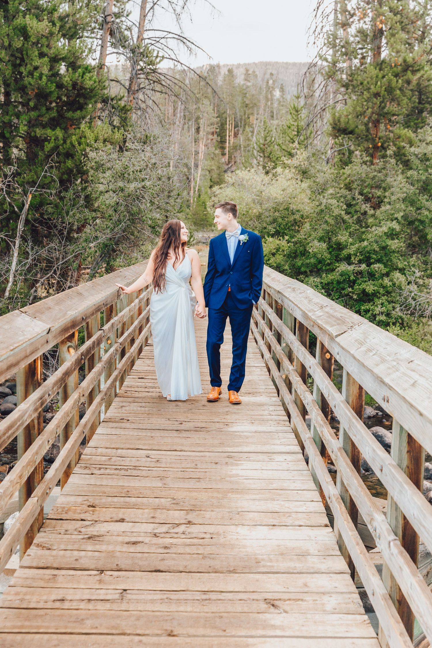 Couple eloping in Colorado surrounded by breathtaking mountain views, vibrant landscapes, and intimate moments