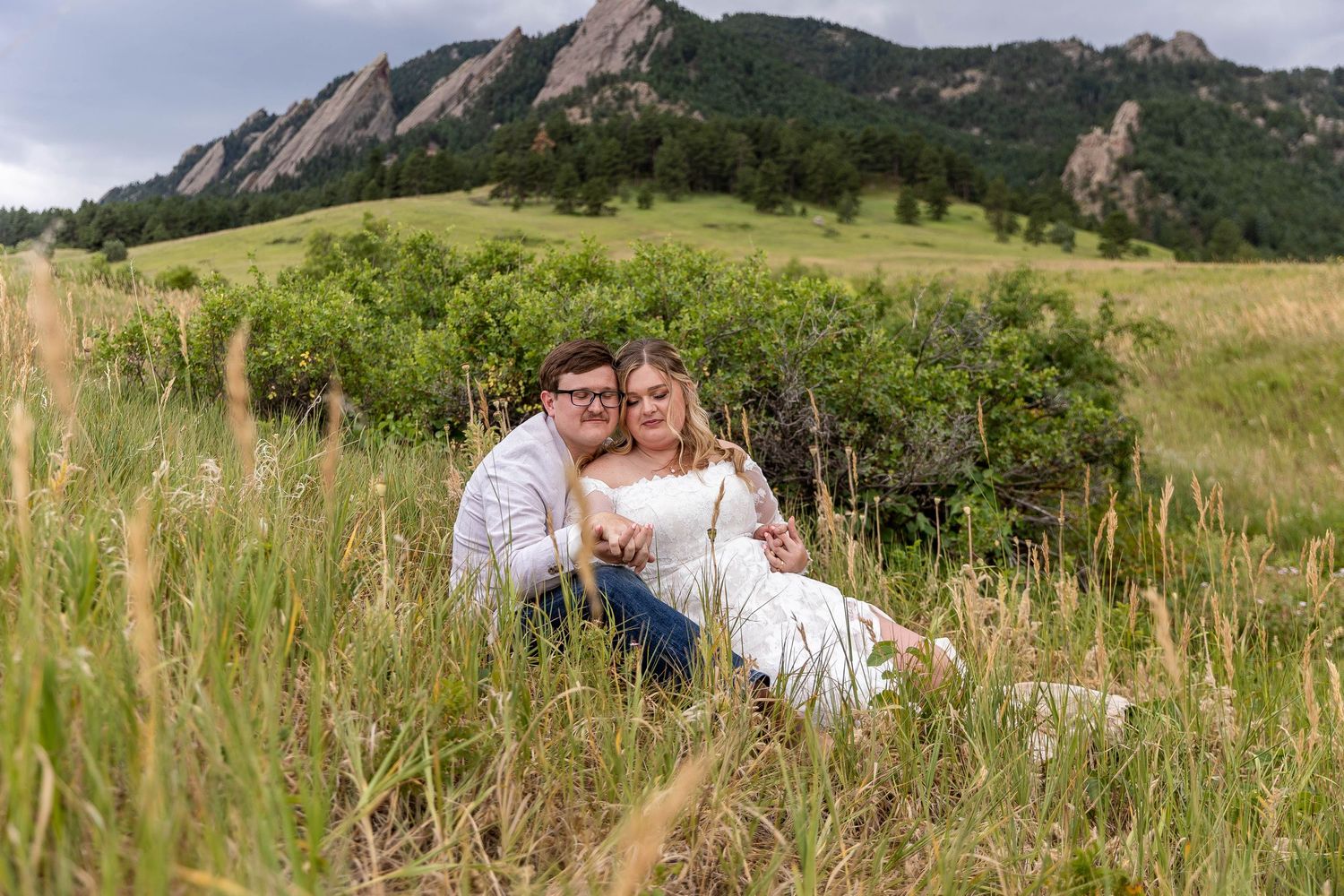 Couple eloping in Colorado surrounded by breathtaking mountain views, vibrant landscapes, and intimate moments