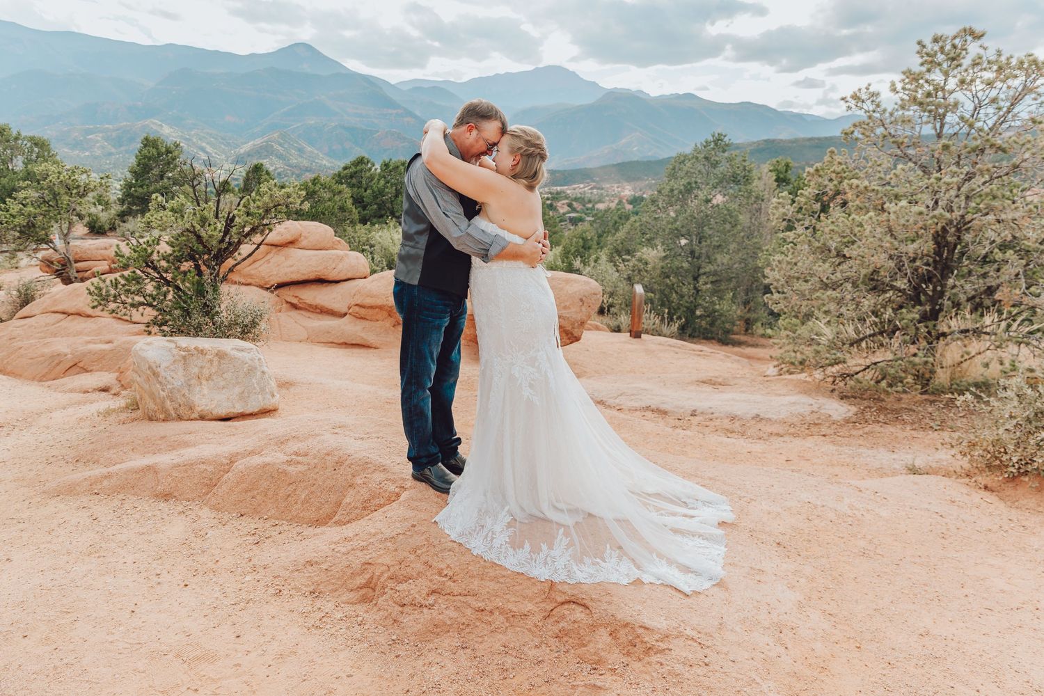 Couple eloping in Colorado surrounded by breathtaking mountain views, vibrant landscapes, and intimate moments