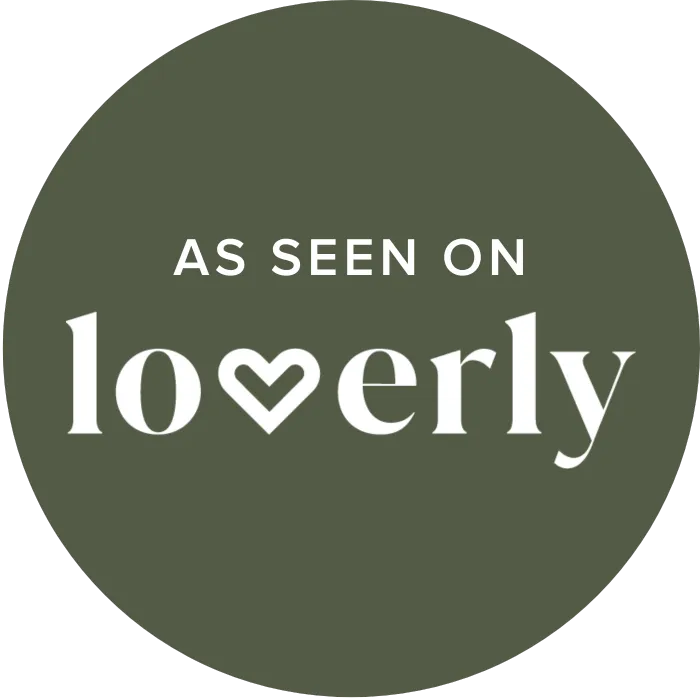 Circular badge in olive green with white text reading As Seen On Loverly, featuring a heart icon in the logo.