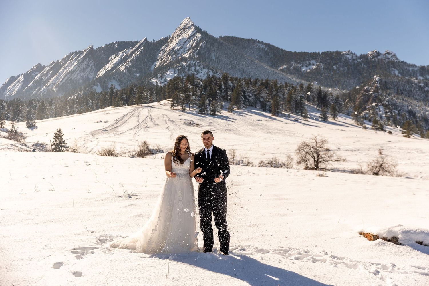 Couple eloping in Colorado surrounded by breathtaking mountain views, vibrant landscapes, and intimate moments