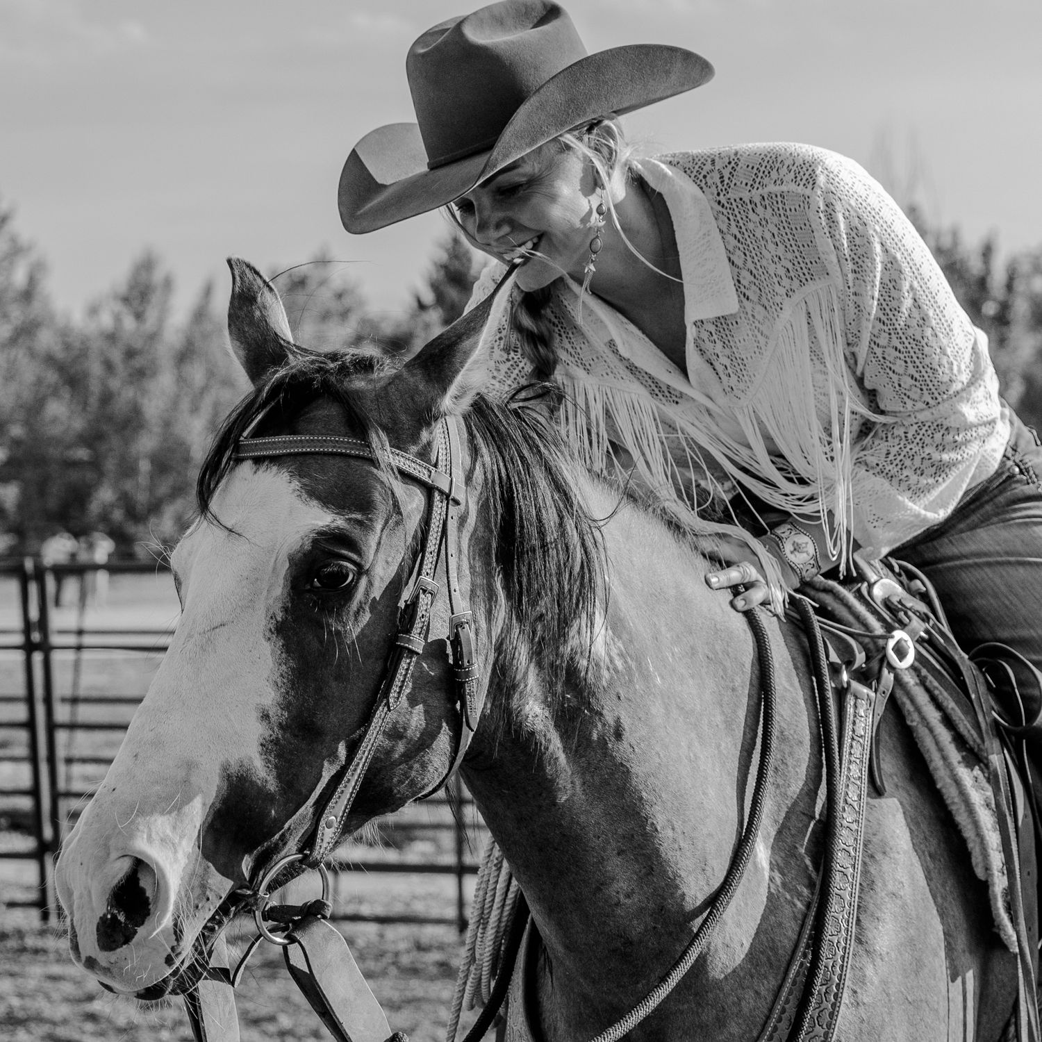 A black and white photo series showing a cowboy training and riding a horse in a corral.