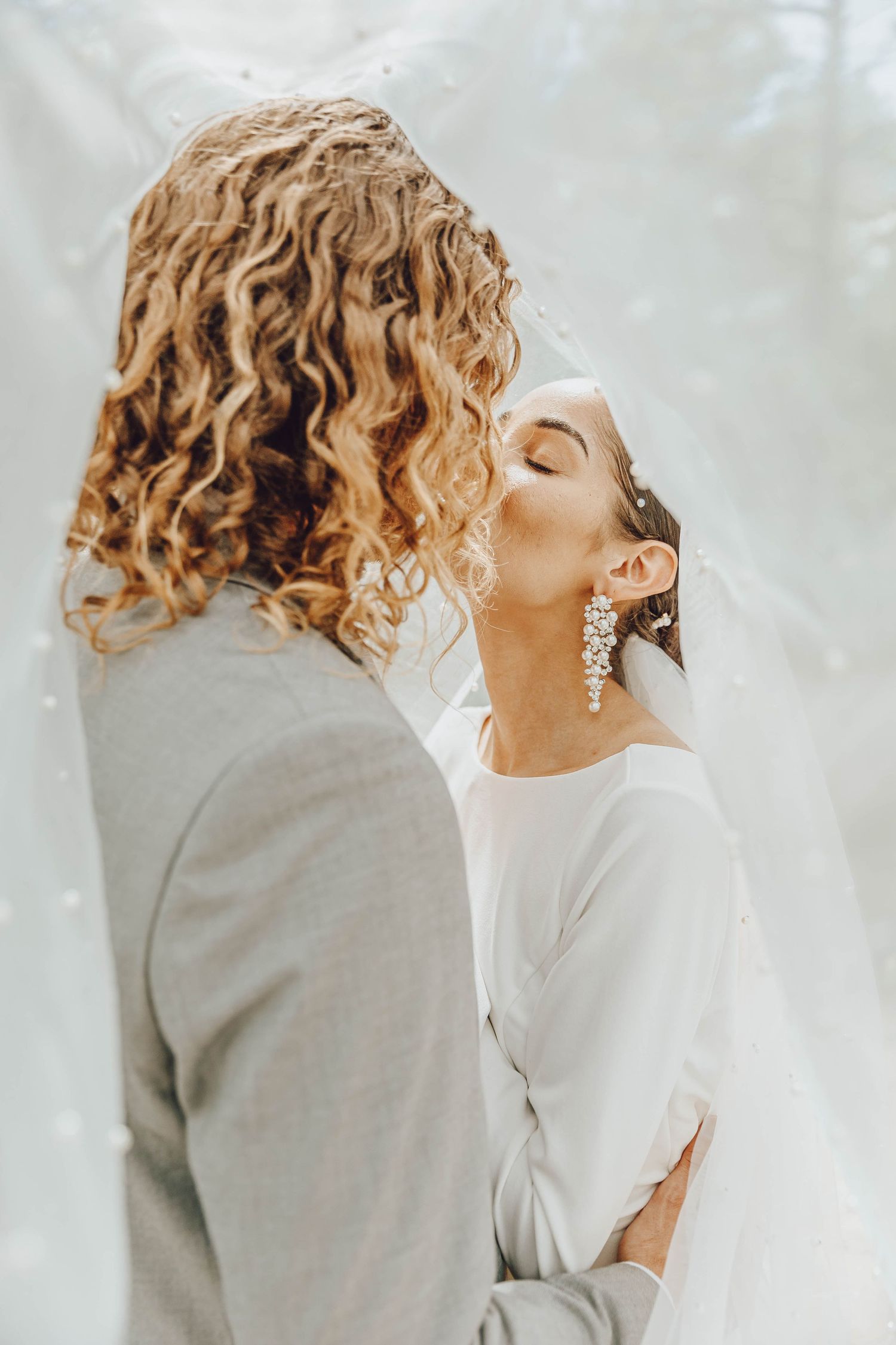 Couple eloping in Colorado surrounded by breathtaking mountain views, vibrant landscapes, and intimate moments