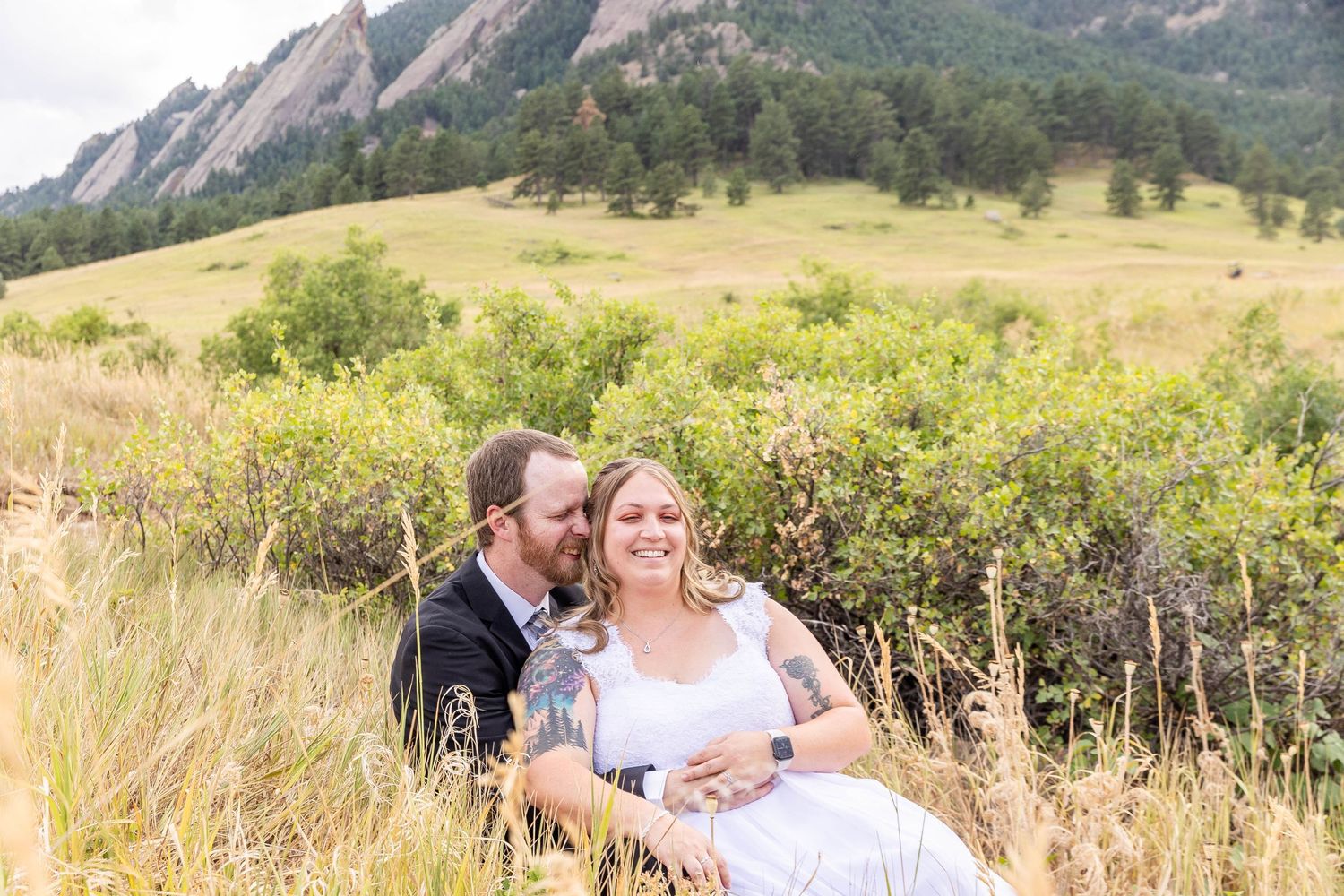 Couple eloping in Colorado surrounded by breathtaking mountain views, vibrant landscapes, and intimate moments