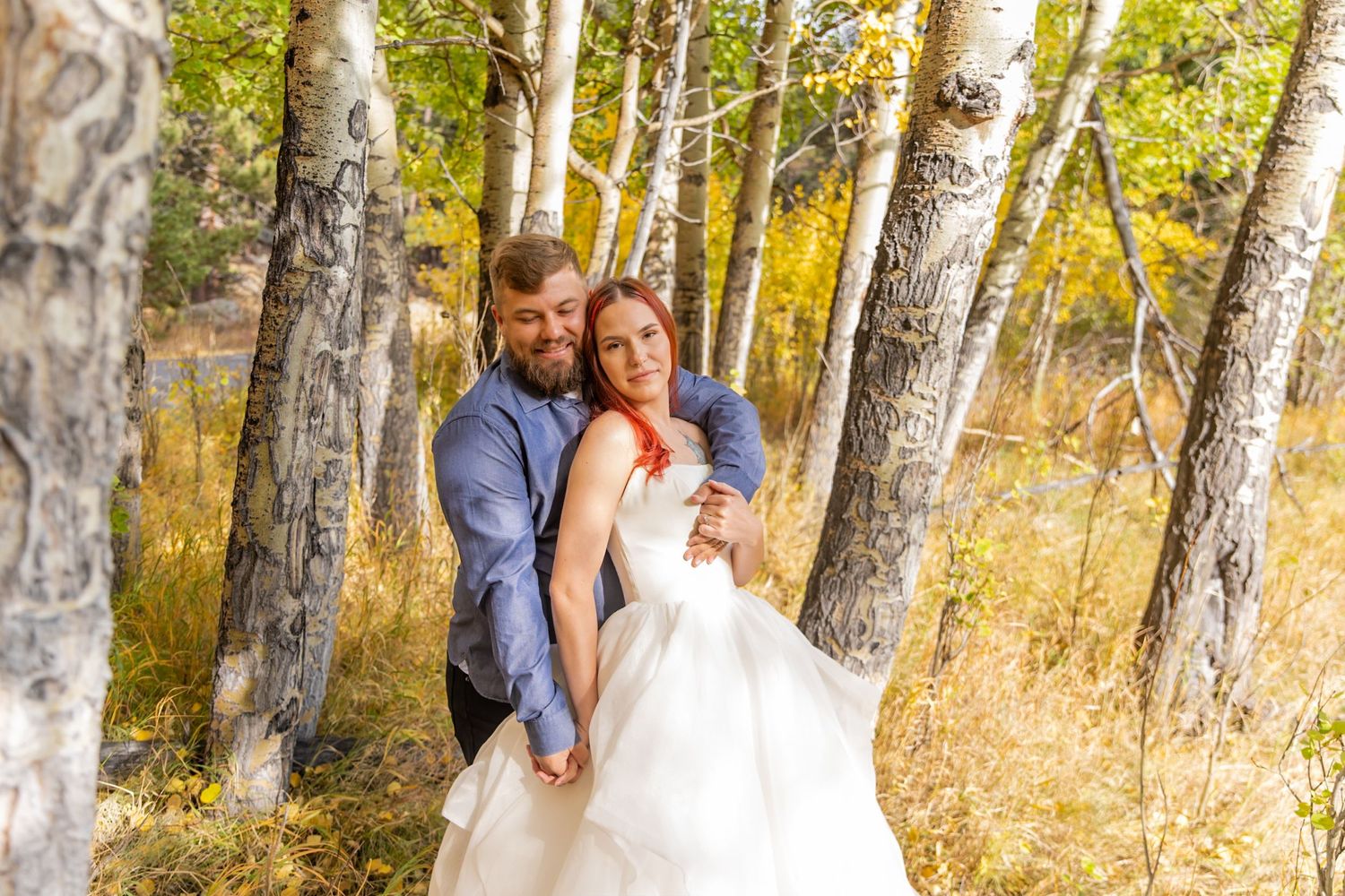 Elegant wedding at the Atlas Theater in Greeley, CO, with a stunning fall post-wedding adventure in Rocky Mountain National Park.