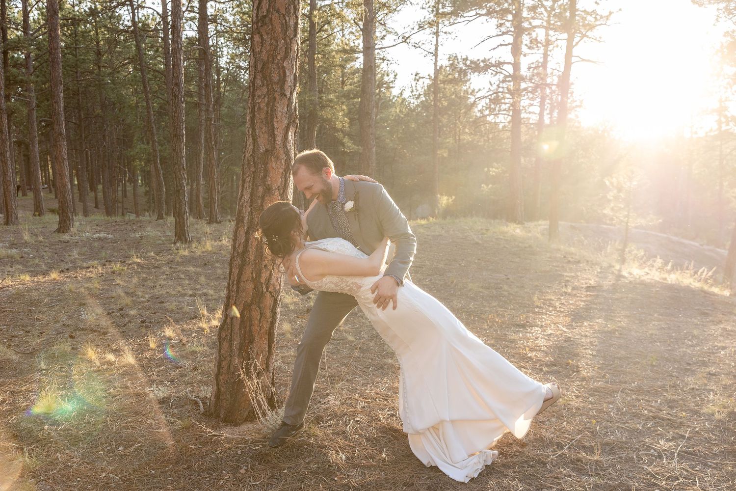 Couple eloping in Colorado surrounded by breathtaking mountain views, vibrant landscapes, and intimate moments