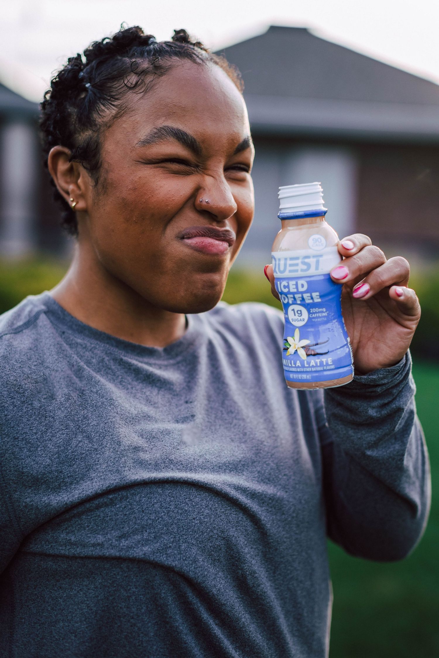 Someone in a gray sweater holds and drinks from a small blue and white jar in a sequence of photos.