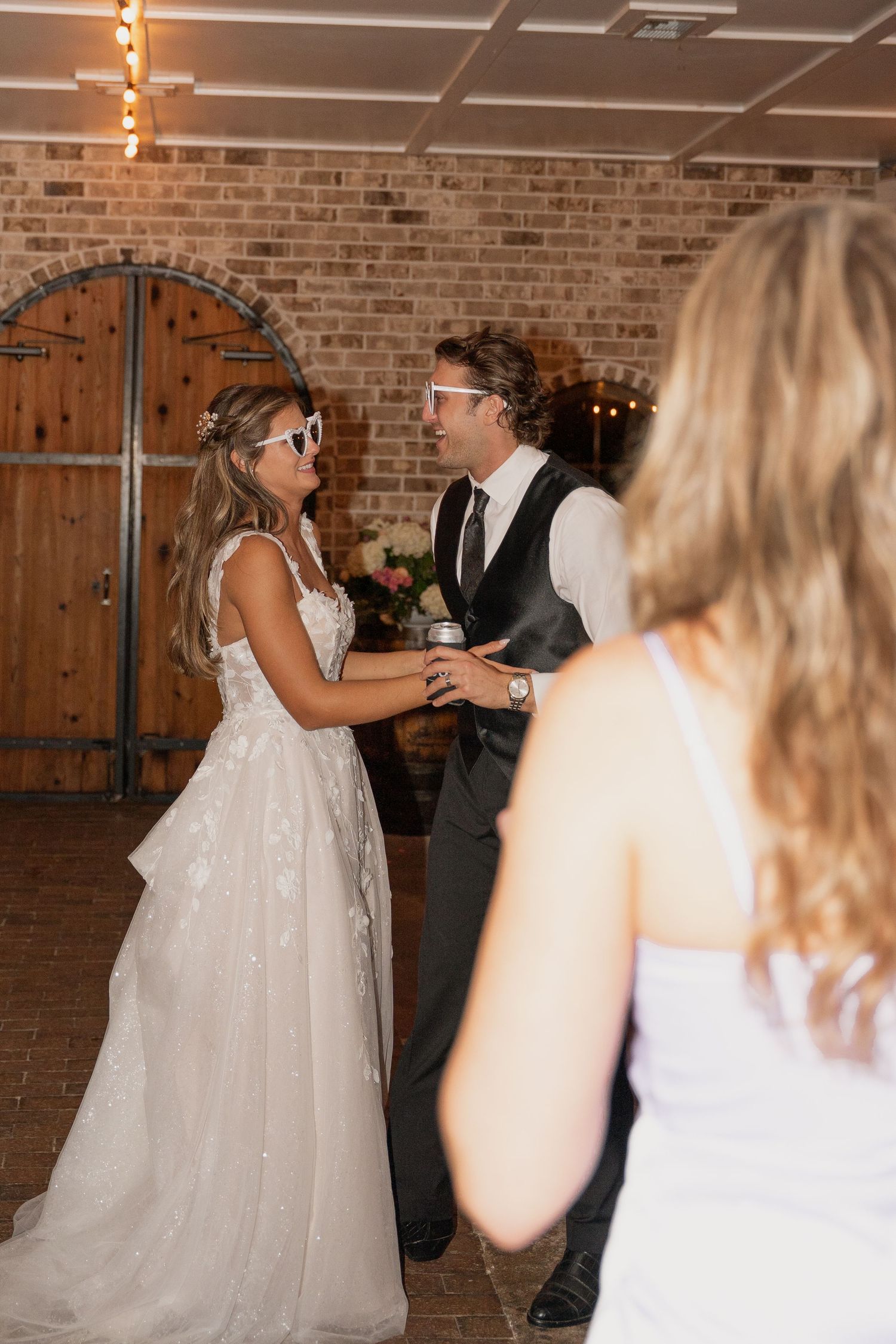 Bride and Groom dancing at their wedding photograph.