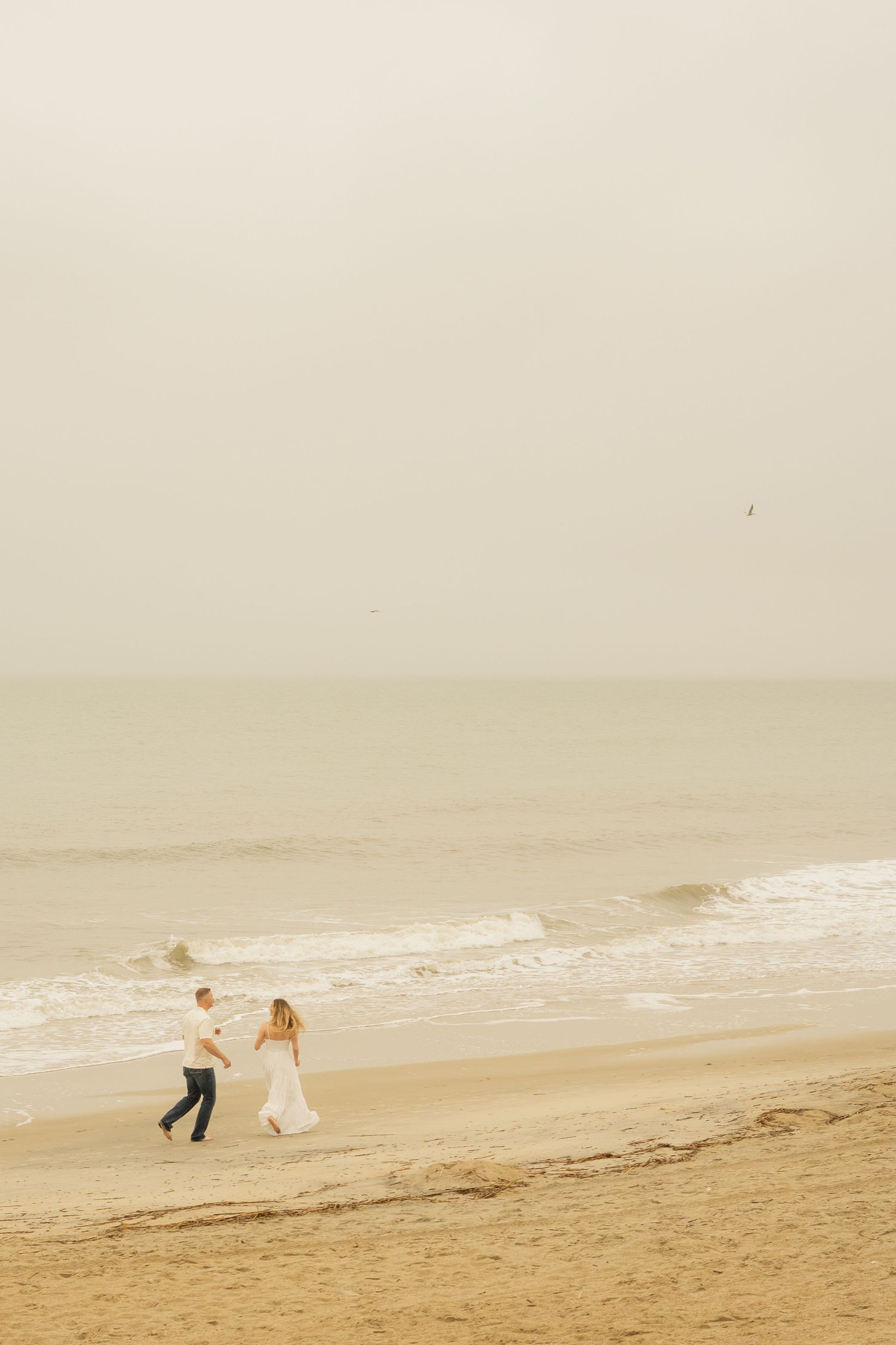 Couples Engagement Portraits at Tybee Island Pier Savannah Georgia