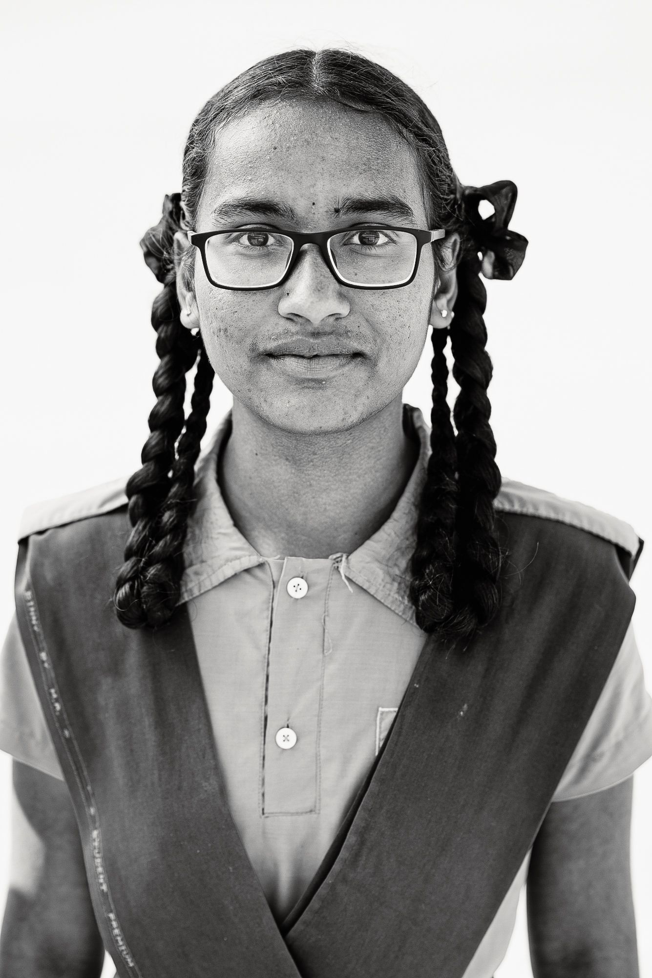 Black-and-white headshot of India students.