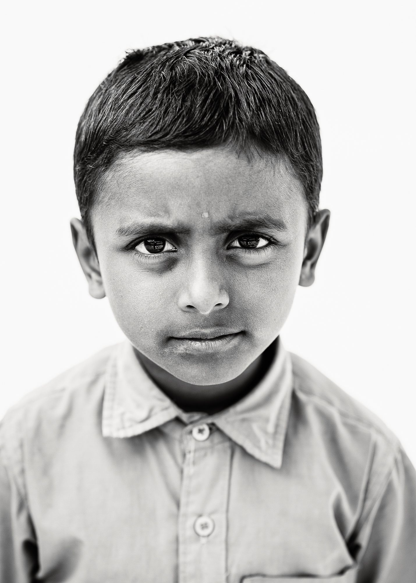 Black-and-white headshot of India students.