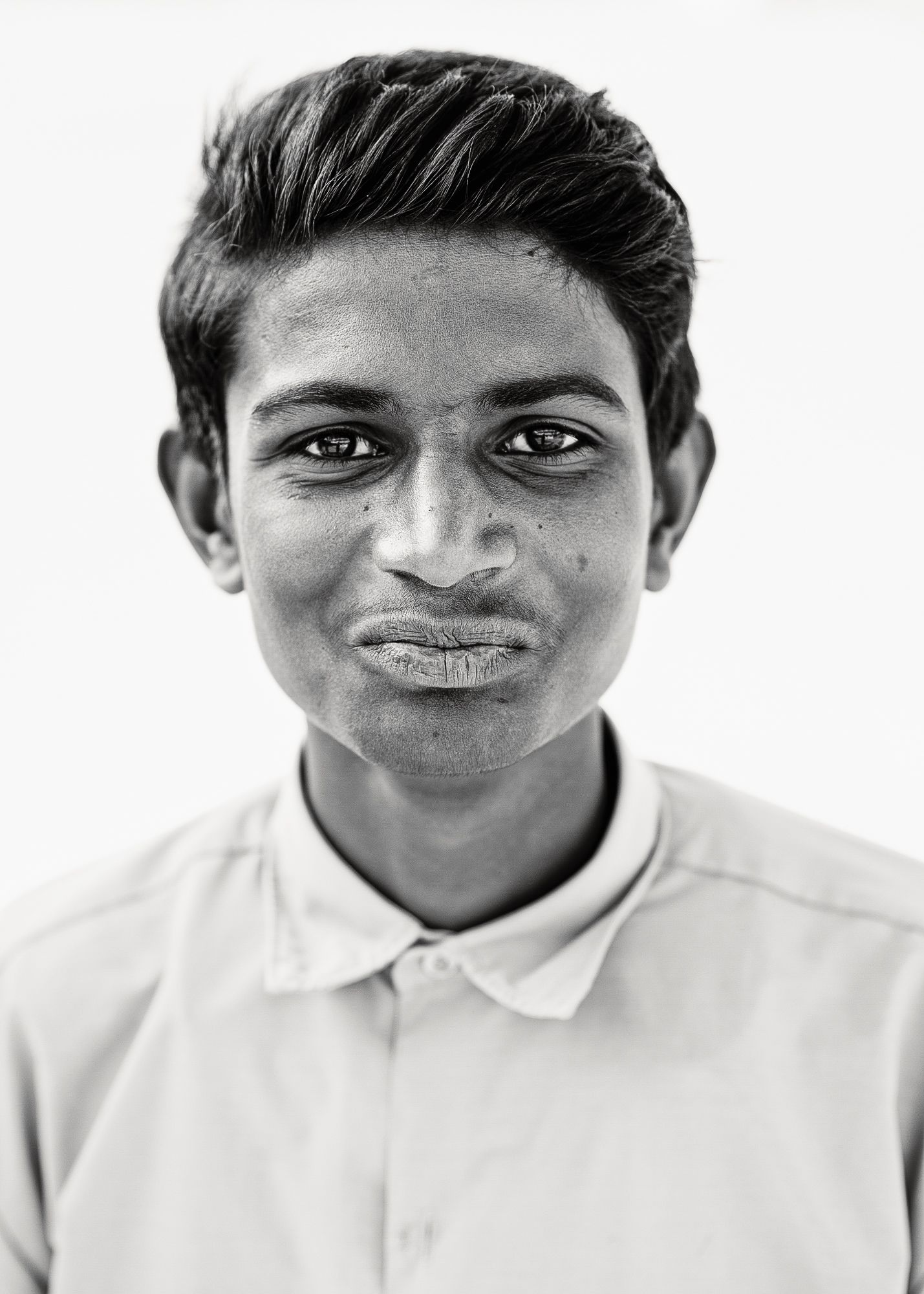 Black-and-white headshot of India students.