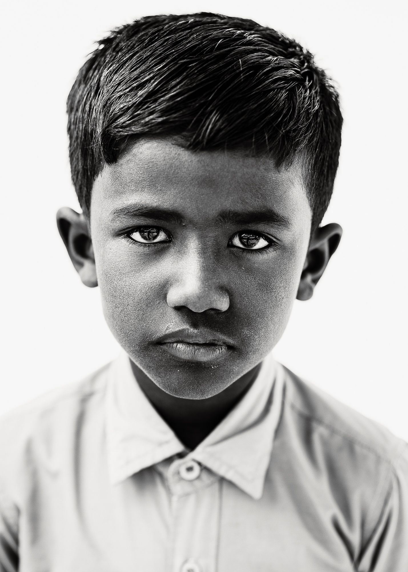 Black-and-white headshot of India students.