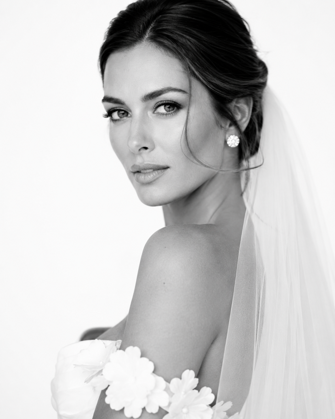 Black-and-white bridal portrait photographed by The Portrait Experience mobile studio at a wedding.