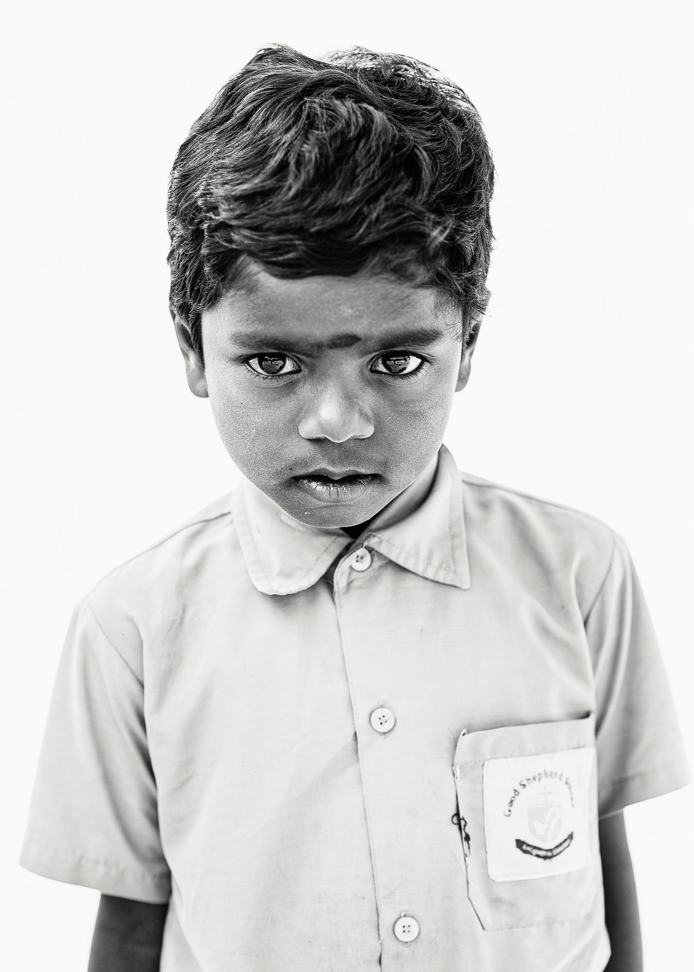 Black-and-white headshot of India students.
