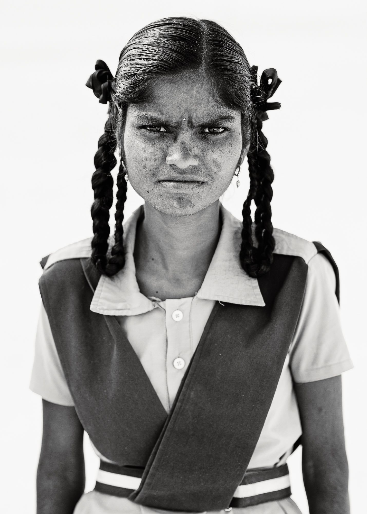 Black-and-white headshot of India students.