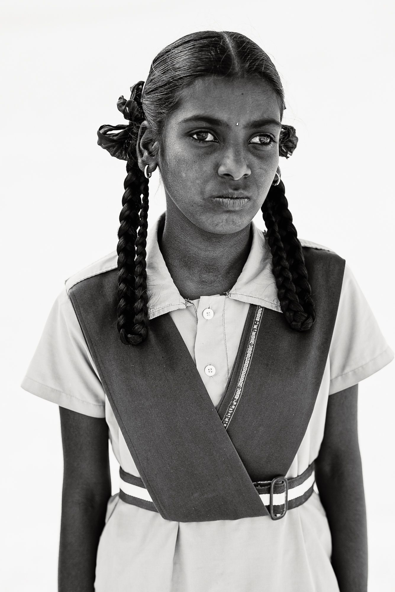 Black-and-white headshot of India students.