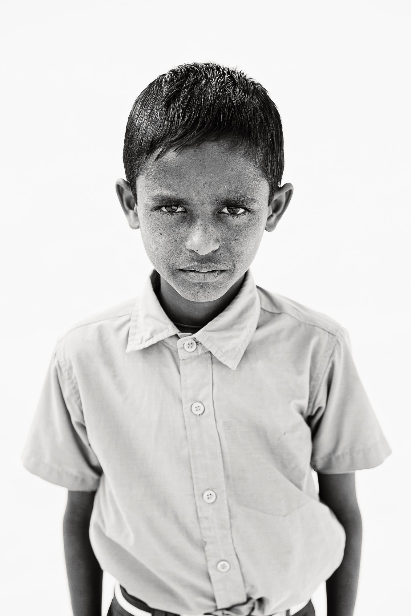 Black-and-white headshot of India students.