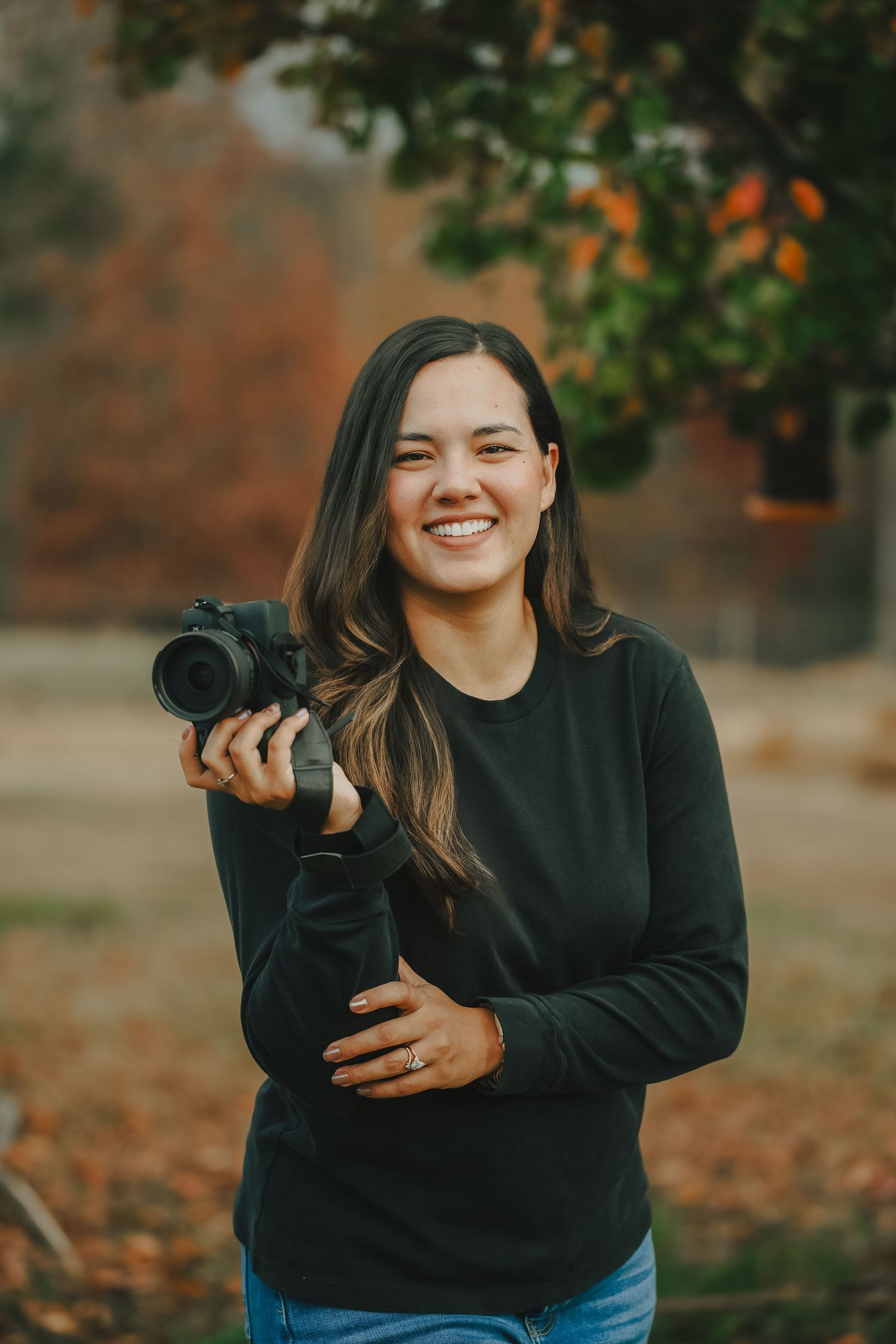 A colorful fall portrait of Sarah Tullock Photography in Spotsylvania, Virginia.