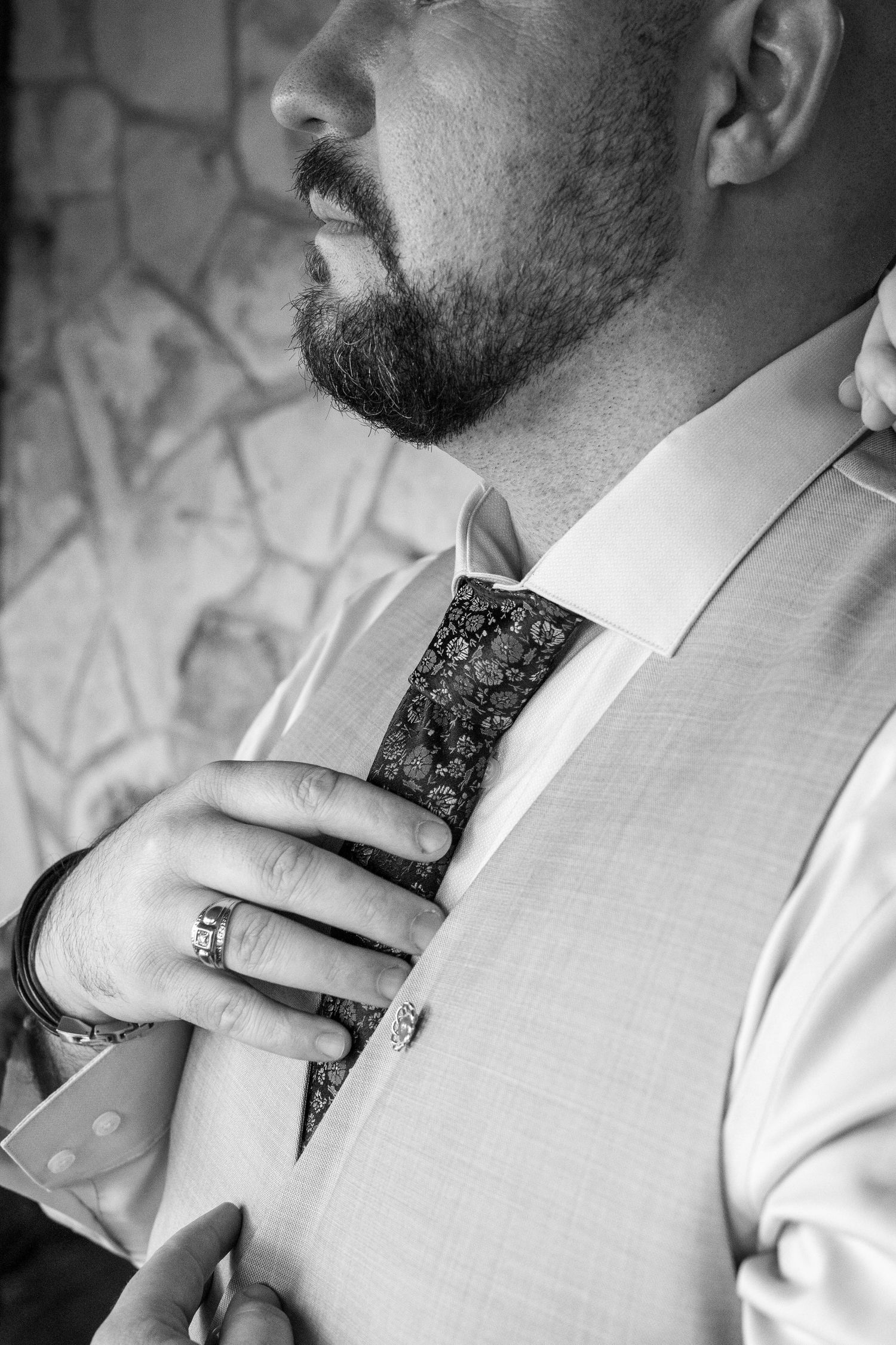 A groom preps before the wedding ceremony in Texas.