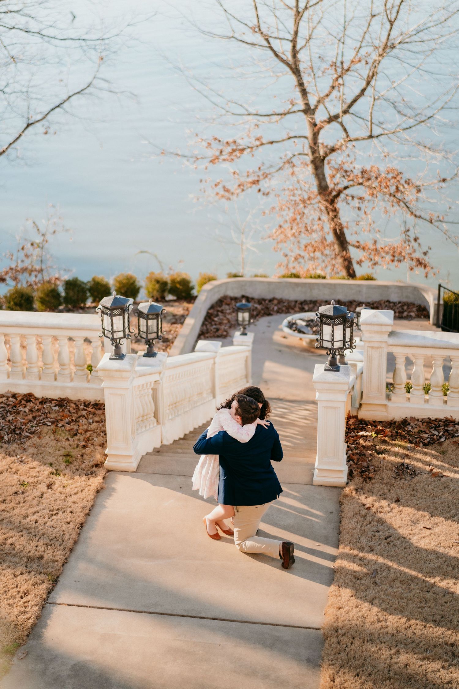 Three photos of a stone balcony with benches and decorative railings captured during a sunset with soft lighting.