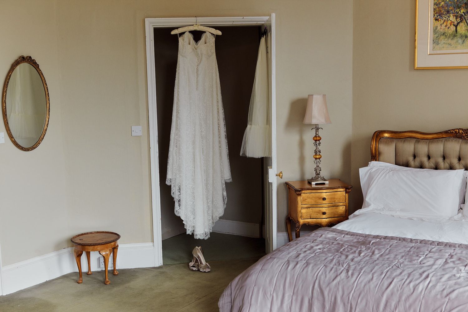 Light-filled bedroom with white curtains and neutral decor creating a peaceful morning atmosphere.