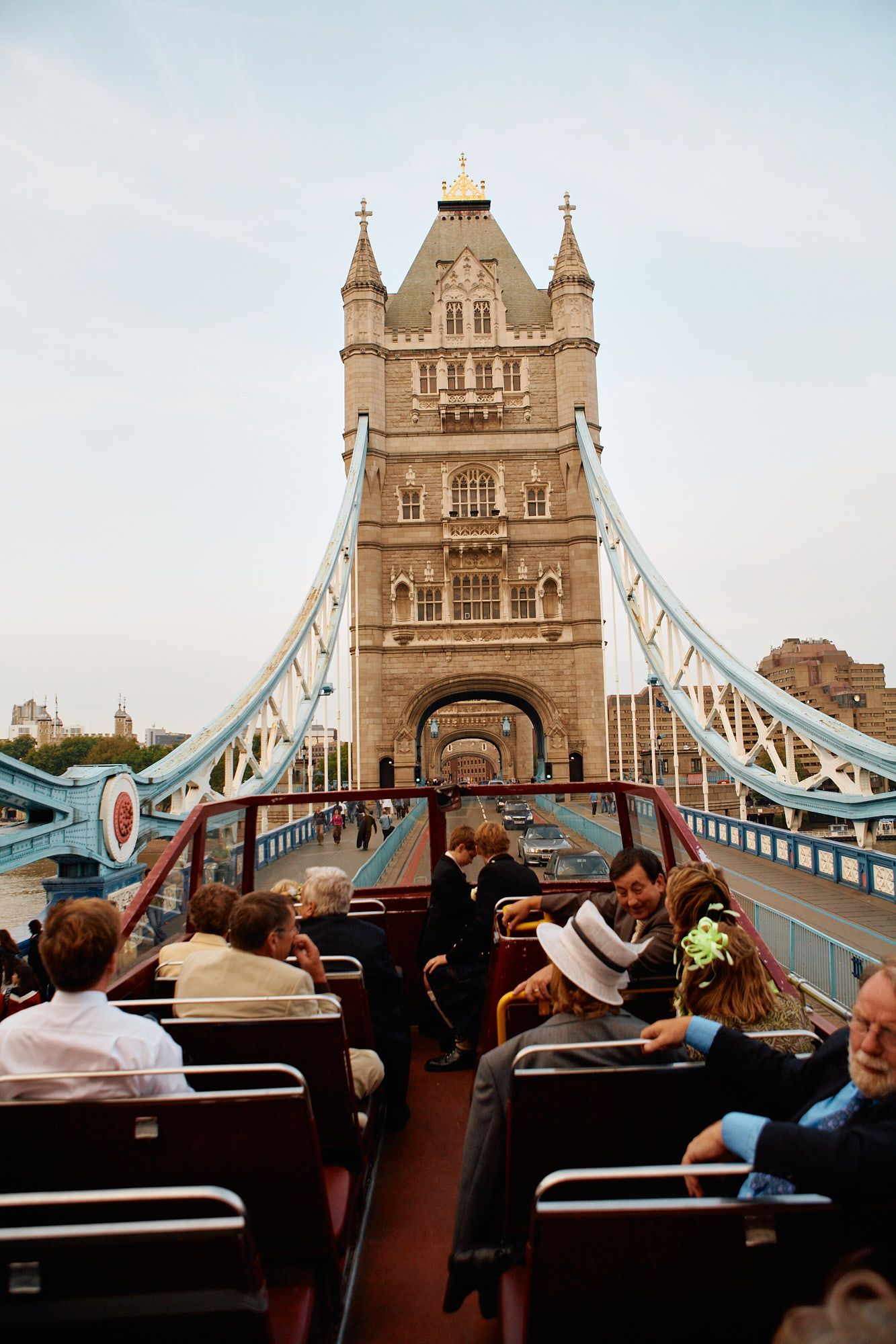 View of London's Tower Bridge from a wedding tour bus with guests taking in the sights.