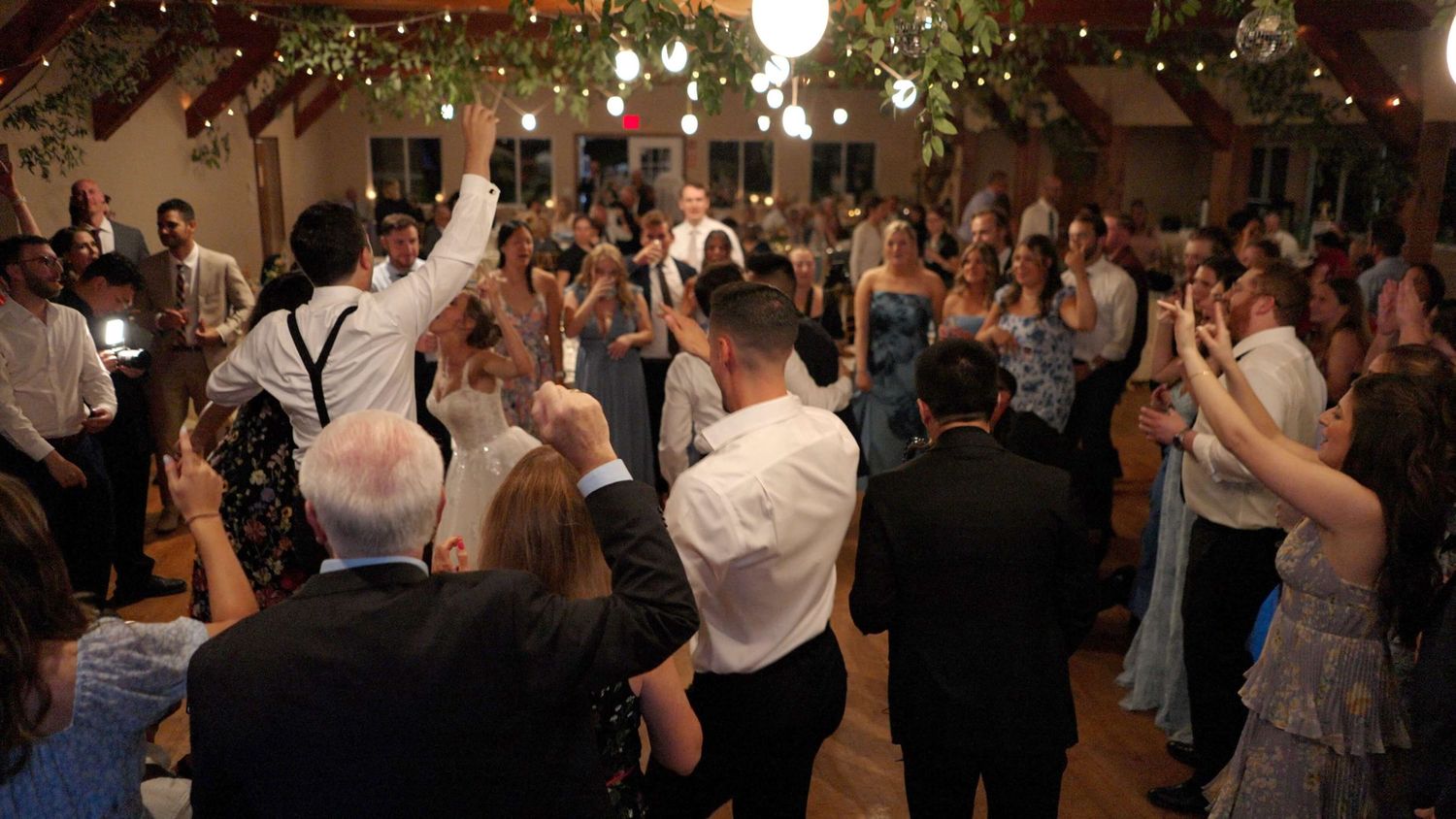Guests dancing at reception at Arrow Park